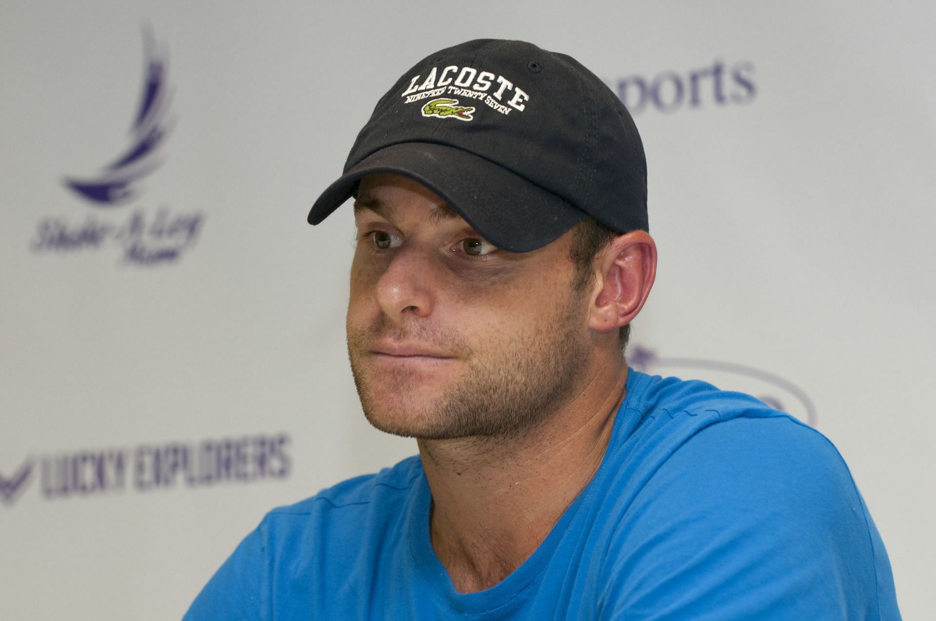 Andy Roddick looks on during a media interaction