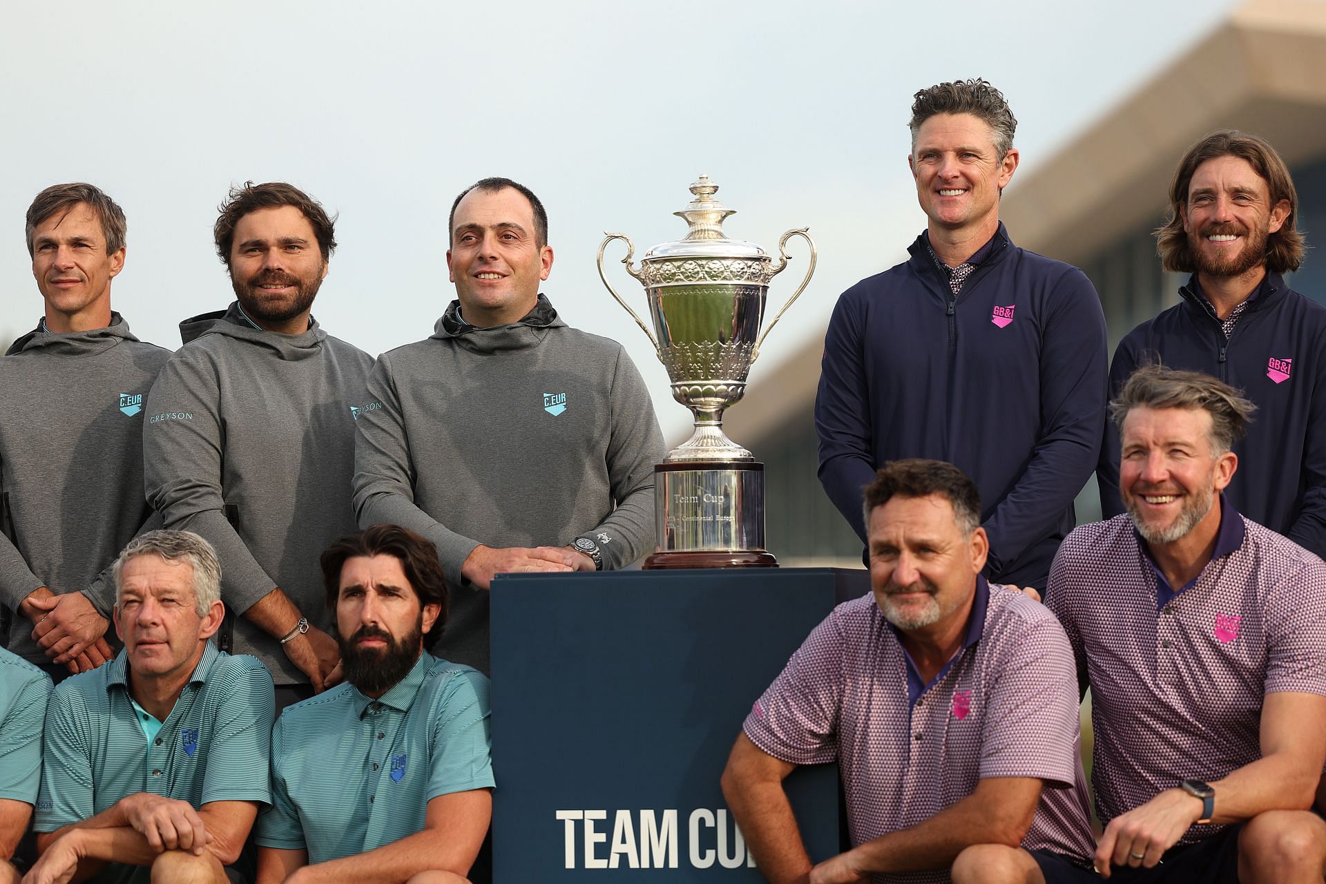 Team Cup captains Justin Rose and Francesco Molinari, other players with the trophy (Image via Getty).