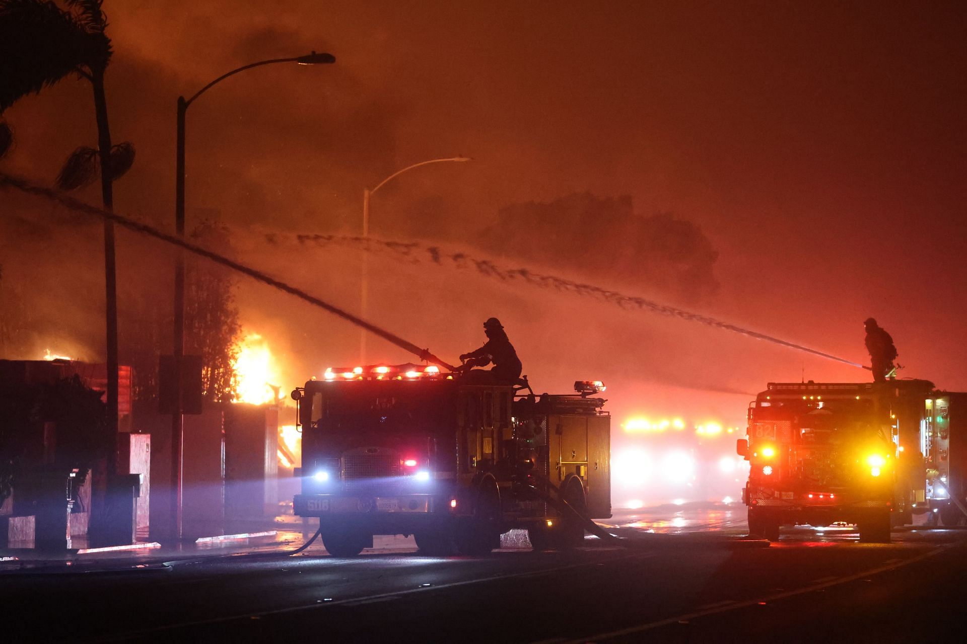 Firefighters continue battling Palisades fire in Los Angeles as flames rage out of control (Image via Getty)