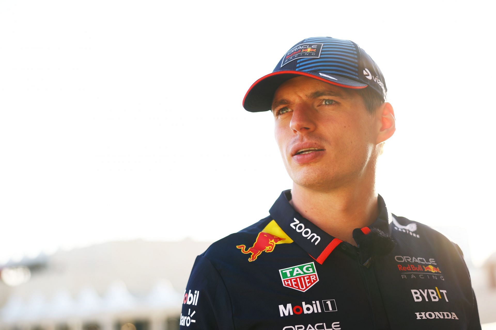 Max Verstappen of the Netherlands and Oracle Red Bull Racing looks on in the Paddock during previews - Source: Getty