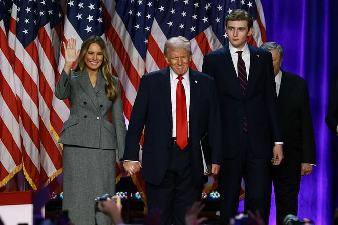 "The real ones know it's real" — Internet reacts to viral AI video of Barron Trump as a giant walking behind lilliput Donald and Melania Trump