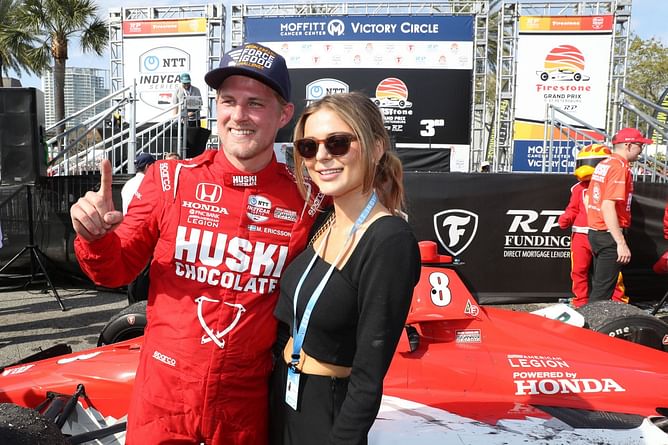 Marcus Ericsson and wife Iris Tritsaris ring in the new year with kisses and champagne