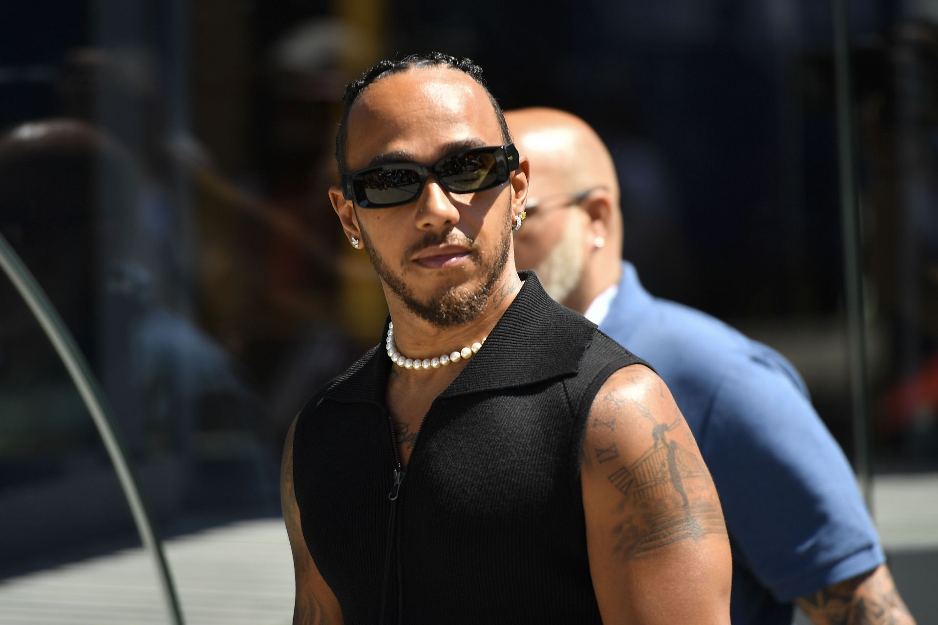 Lewis Hamilton spotted in a suit and tie on his first visit to Maranello