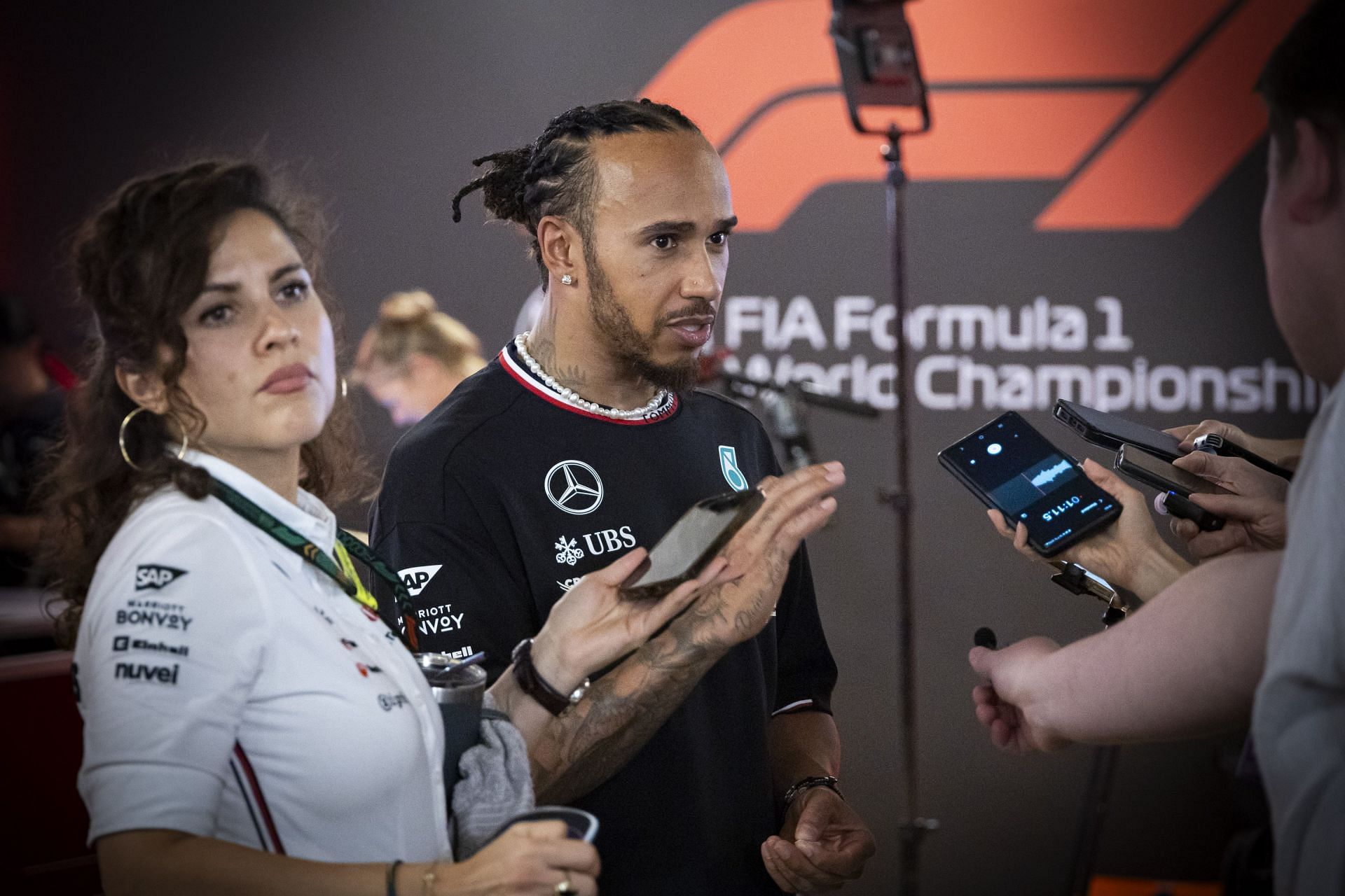 Lewis Hamilton of Great Britain driver of Mercedes-AMG Petronas F1 Team talks to media  - Source: Getty