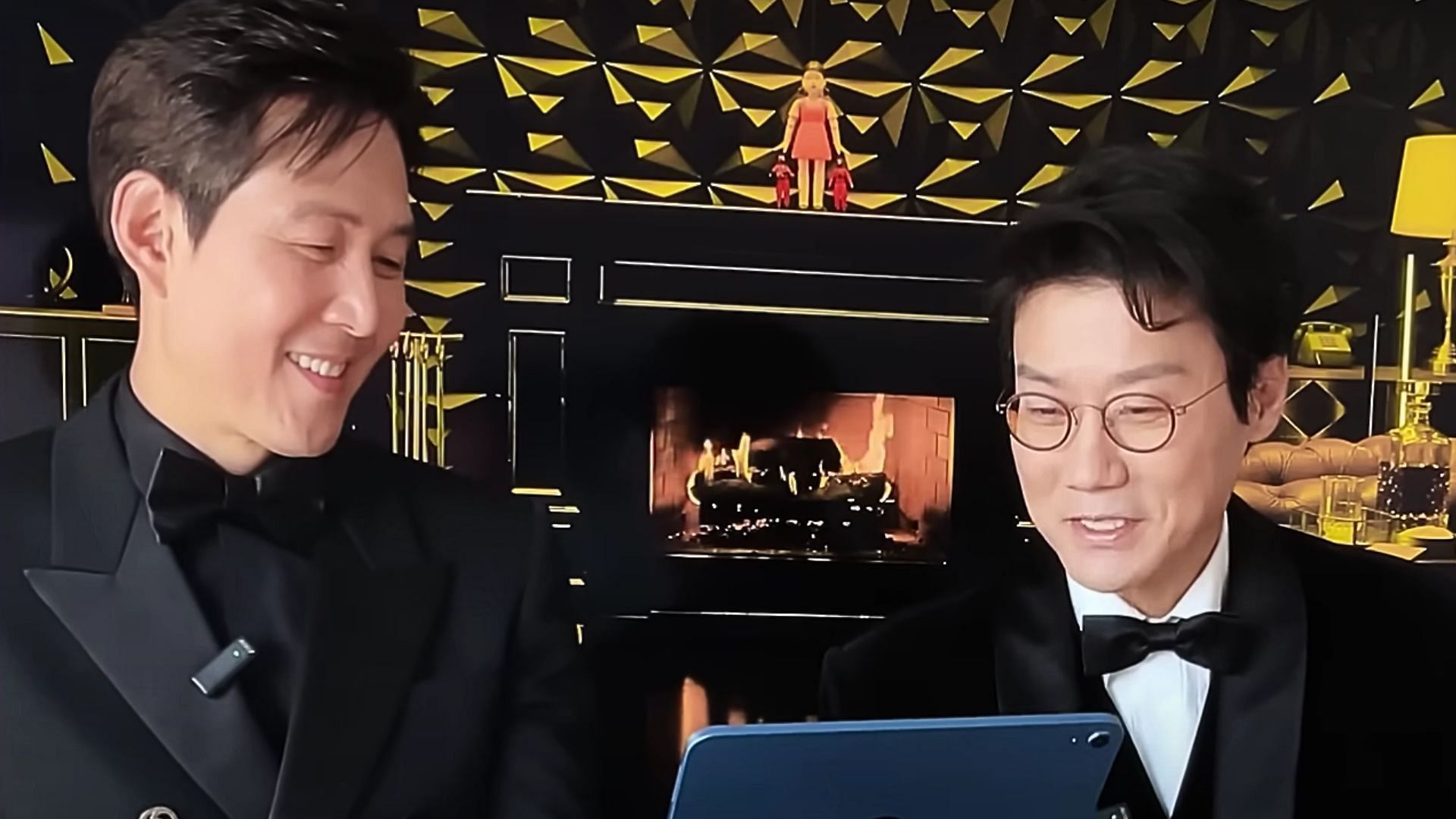 Lee Dong-hyuk and Lee Jung-jae react to fan-made edits (Image via YouTube/Netflix)