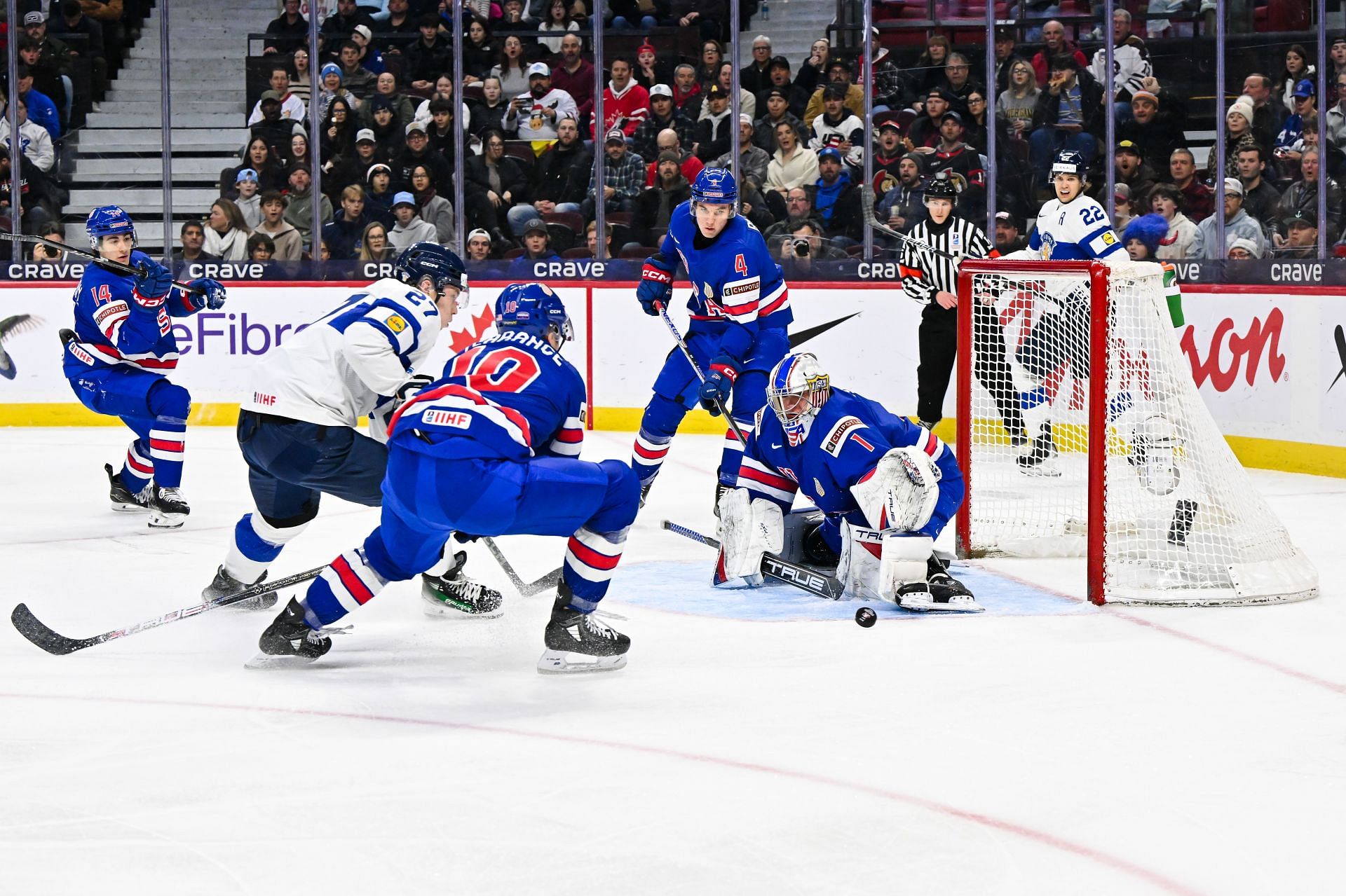 Goaltender Trey Augustine, #1 of Team USA, makes a save in the first period against Team Finland during the gold medal game of the 2025 IIHF World Junior Championship. (Credits: Getty)