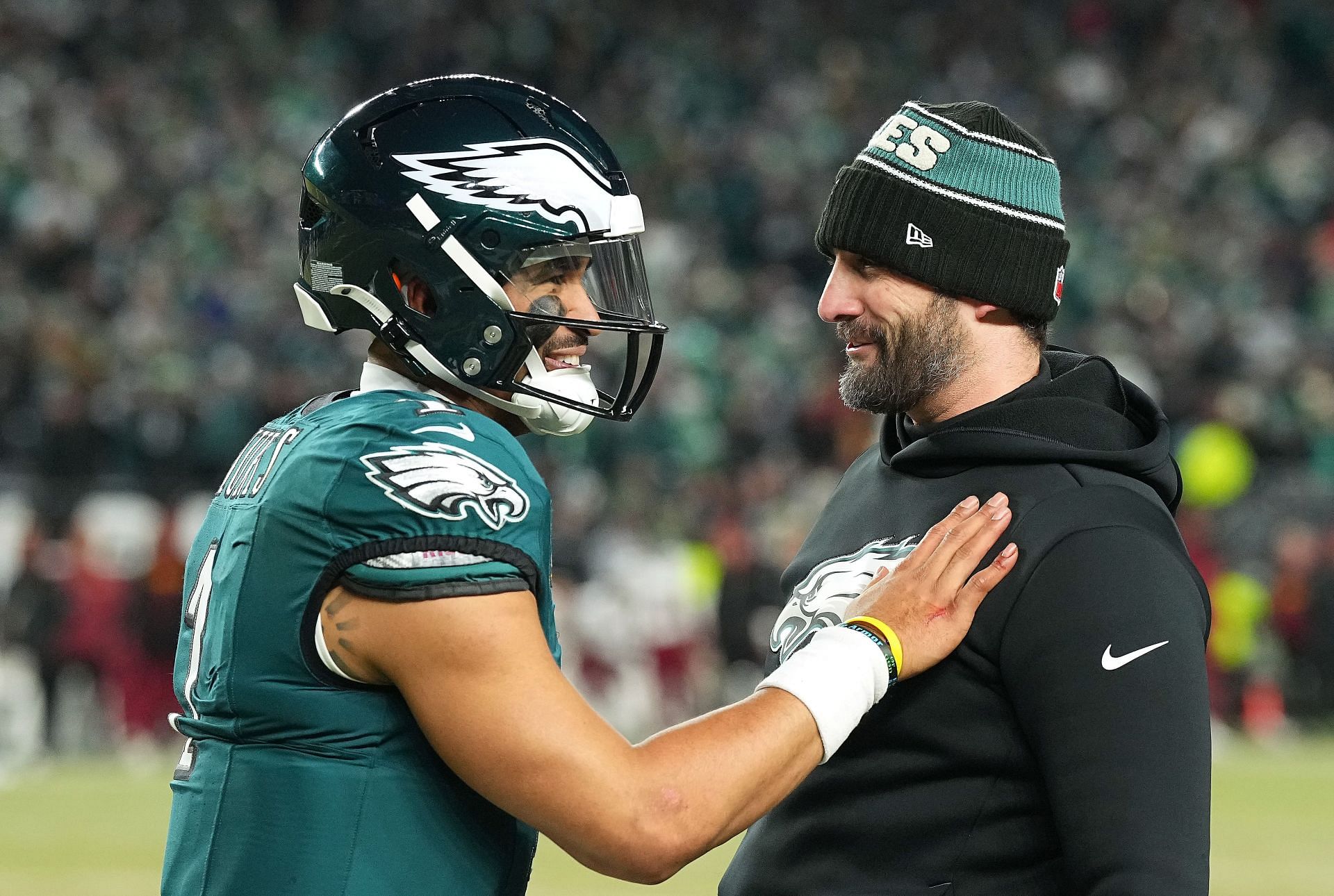 Jalen Hurts #1 of the Philadelphia Eagles celebrates with coach Nick Sirianni after their 55-23 win over the Washington Commanders during the NFC Championship Game at Lincoln Financial Field. (Credits: Getty)