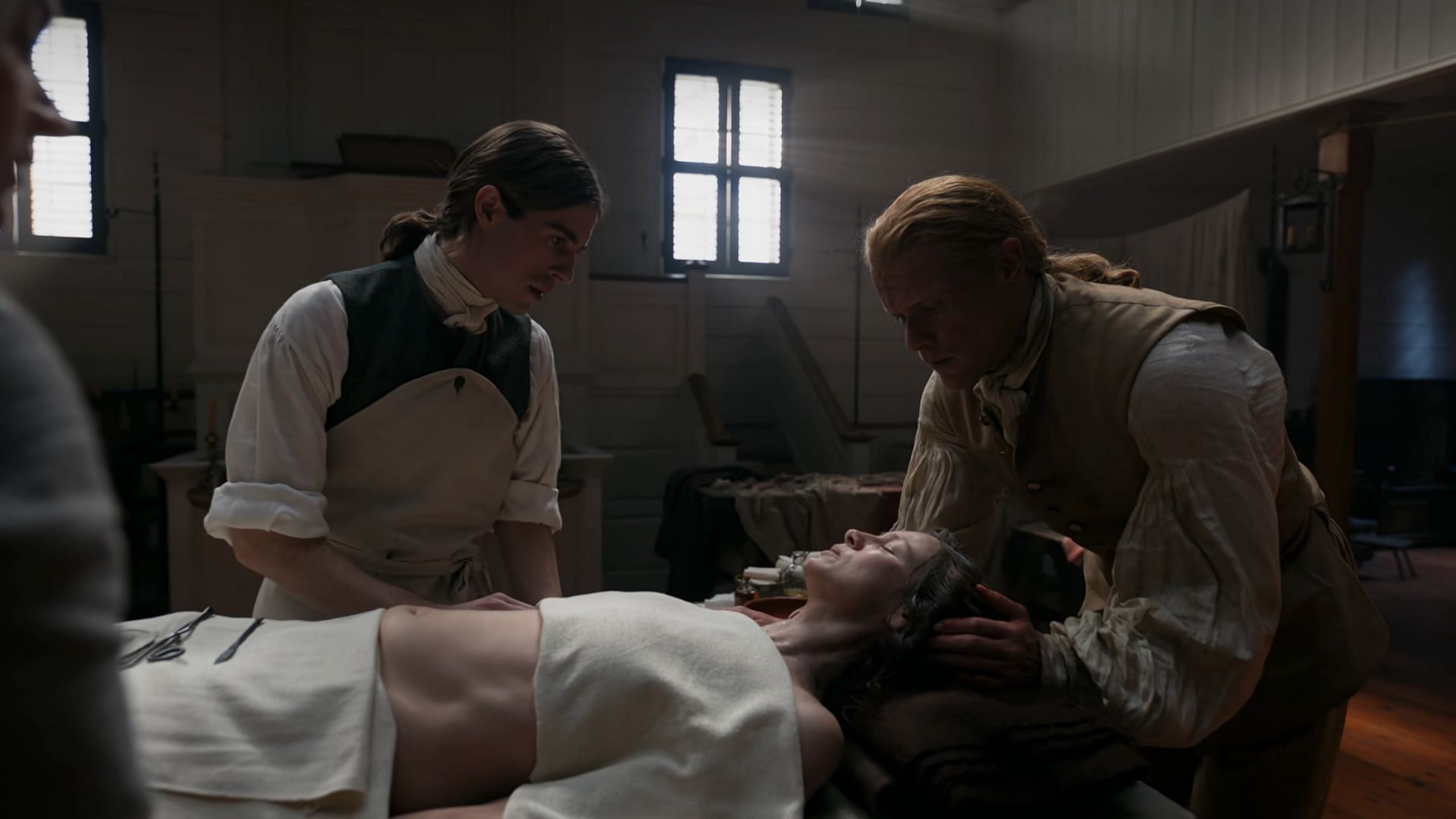 Denzell operates on Claire (Image via Starz)