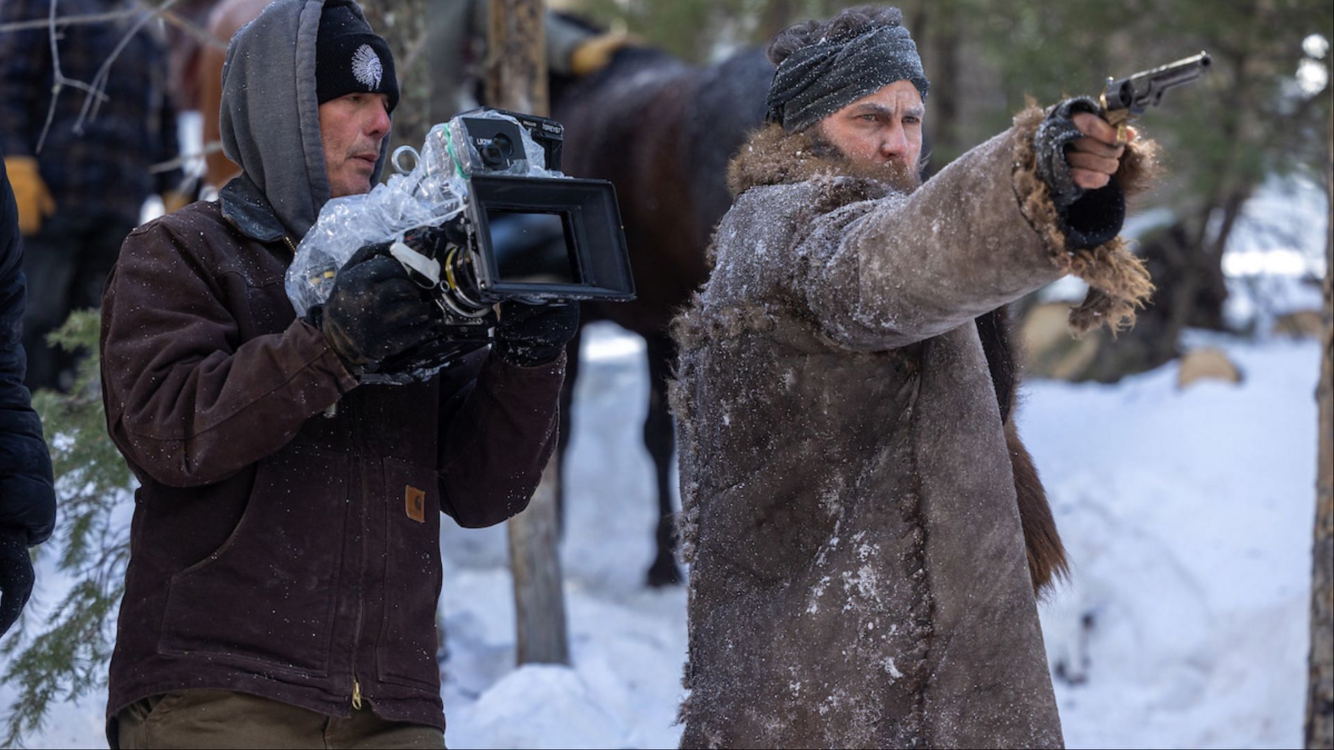 Executive producer Pete Berg and Taylor Kitsch as Isaac (Image via Netflix Tudum)