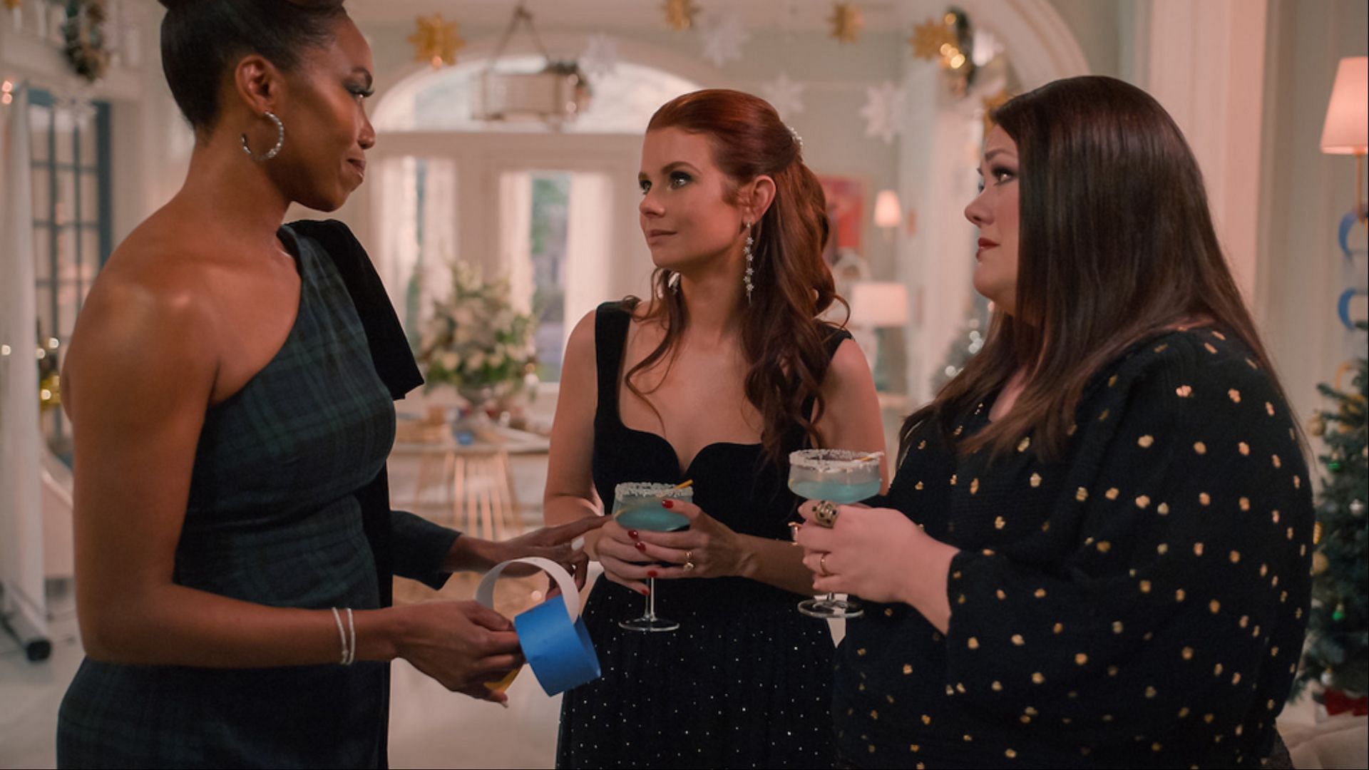 Maddie, Dana Sue, and Helen at a festive gathering - The core trio of Sweet Magnolias season 3 reflect on life, relationships, and the strength of their enduring friendship.