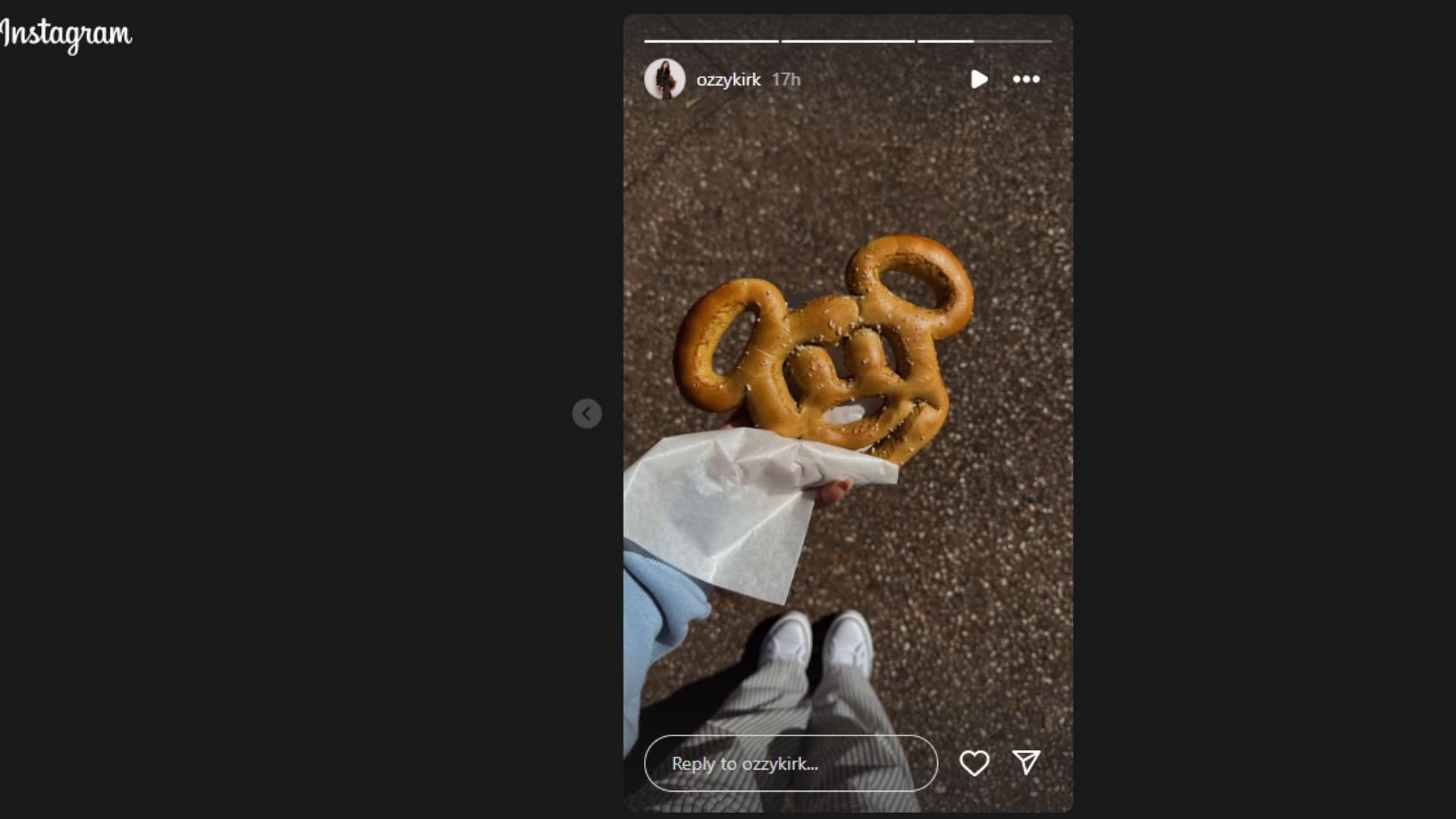 Ozzy Kirk shows off her Mickey Mouse shaped pretzel. (Photo via Instagram Story)