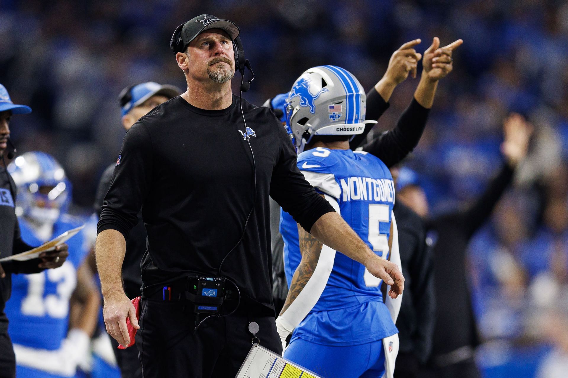 Coach Dan Campbell of the Detroit Lions stands on the sidelines during the second half of the NFL football divisional playoff against the Washington Commanders. (Credits: Getty)