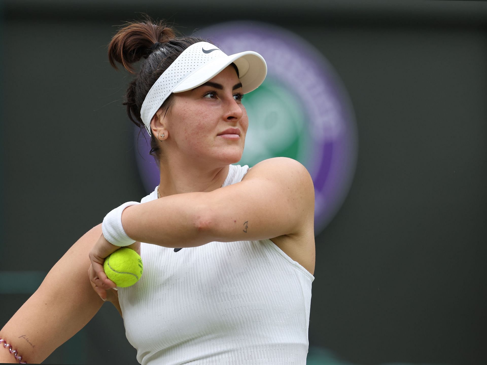 Bianca Andreescu looks on at Wimbledon 2024