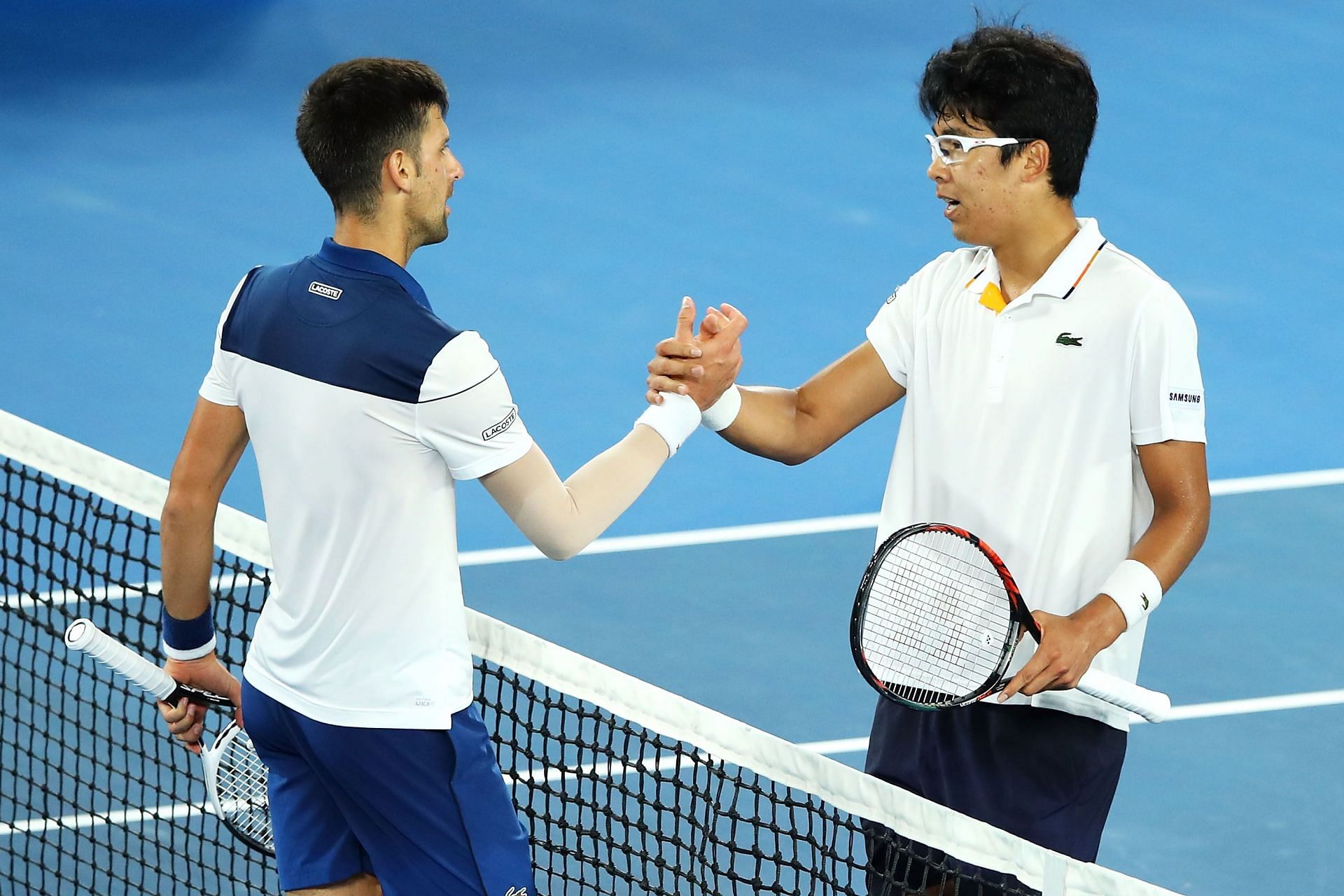 The two men shaking hands after their match. - Source: Getty