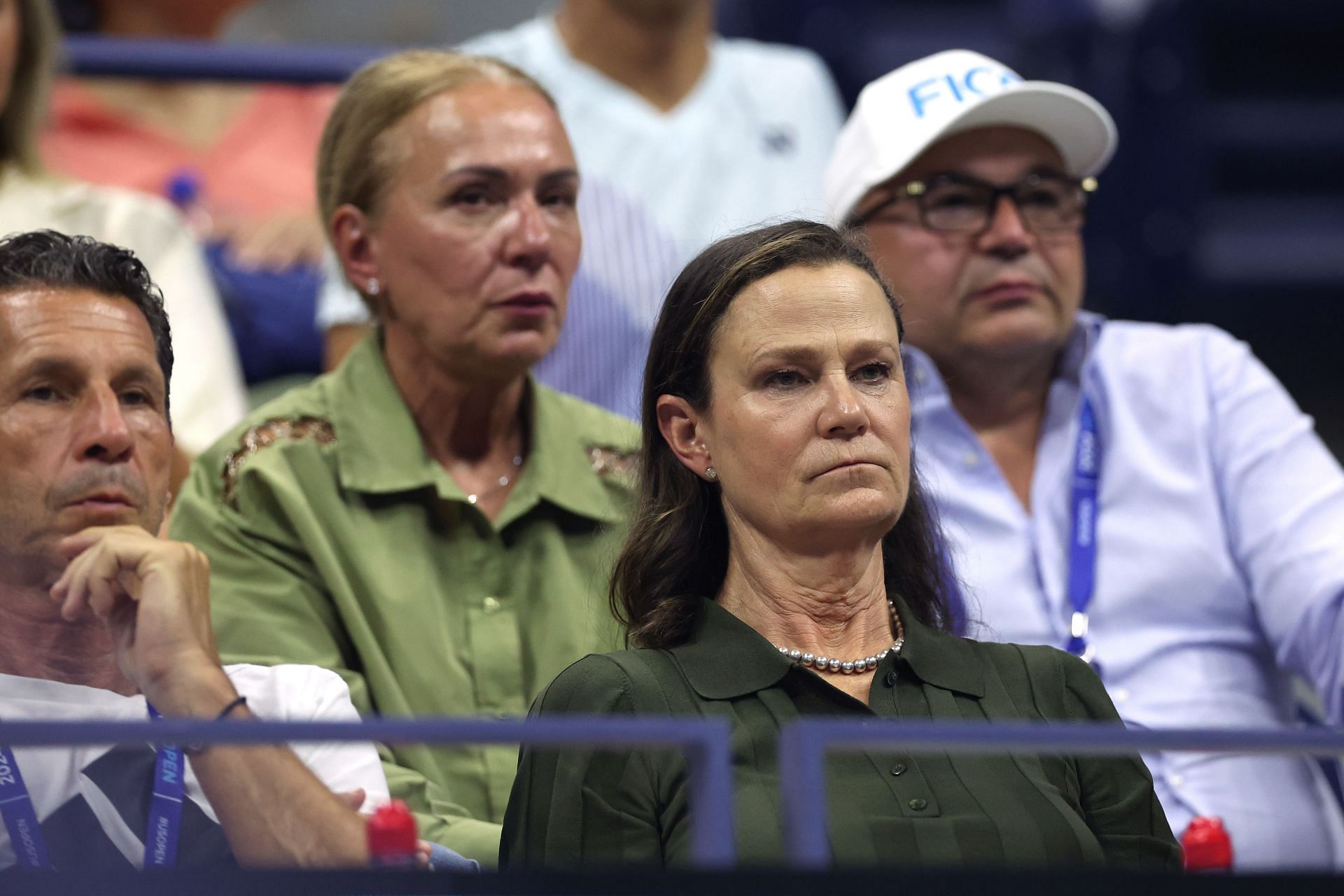 Pam Shriver, wearing a dark green, striped shirt and a beaded necklace, at the 2024 US Open (Source: Getty)