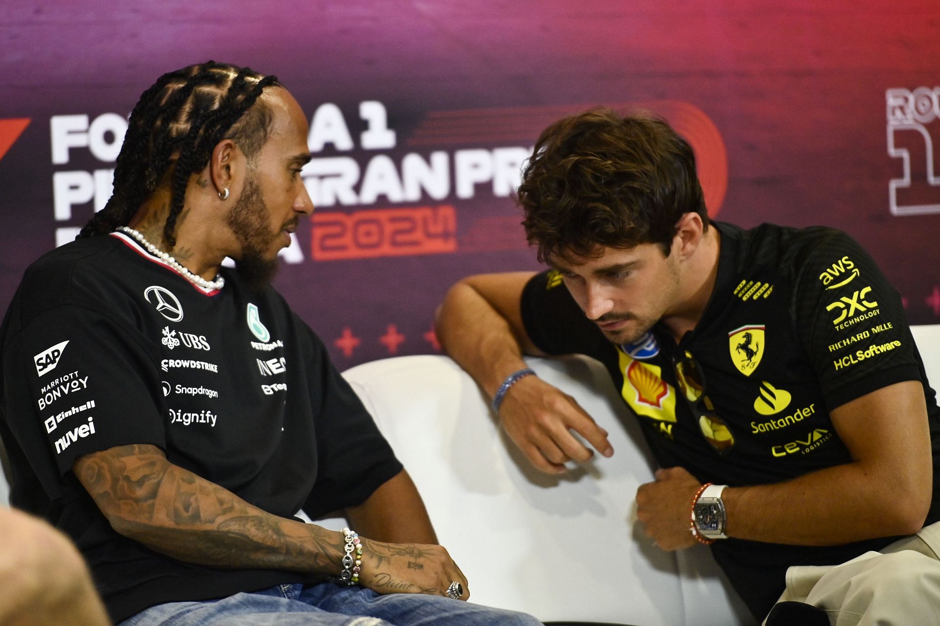 Lewis Hamilton [L] with Charles Leclerc [R] (Image Source: Getty)