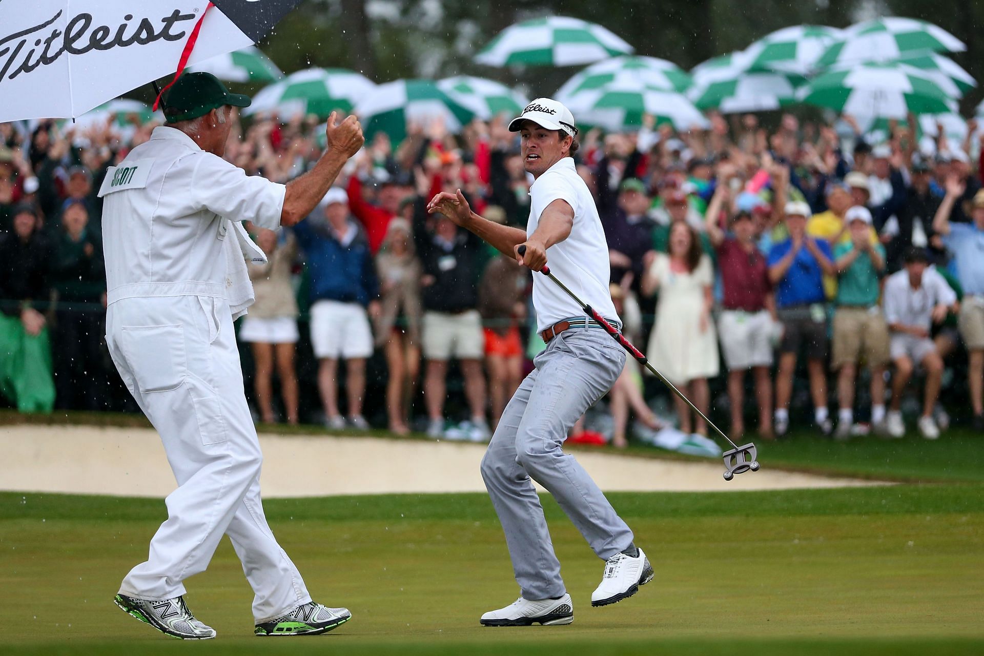 Adam Scott and his caddie Steve Williams celebrating the victory at The Masters 2013 (Image via Getty).