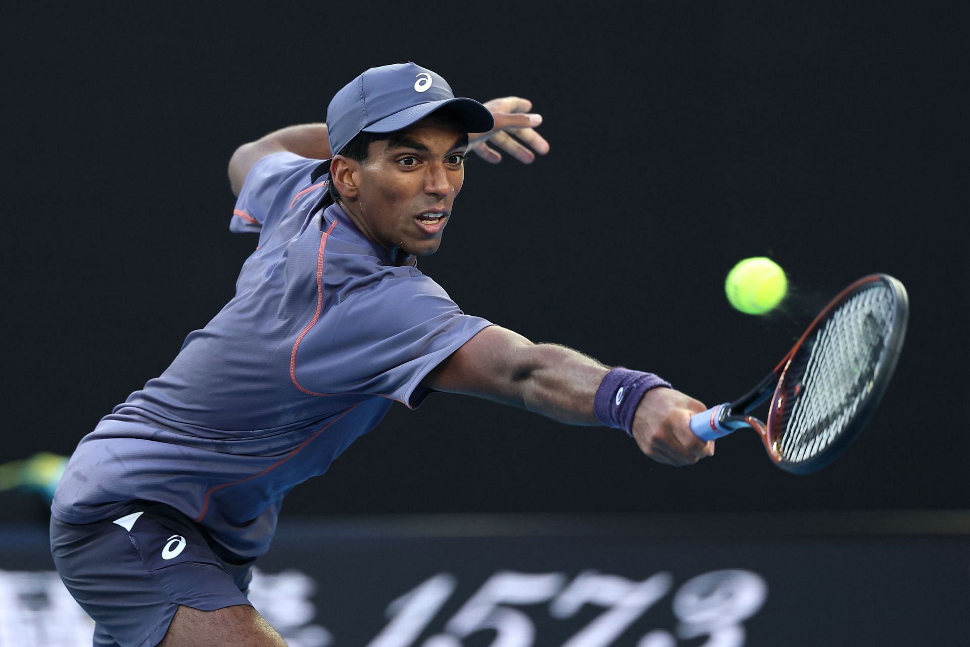 Nishesh Basavareddy pictured against Novak Djokovic at the 2025 Australian Open - Image Source: Getty