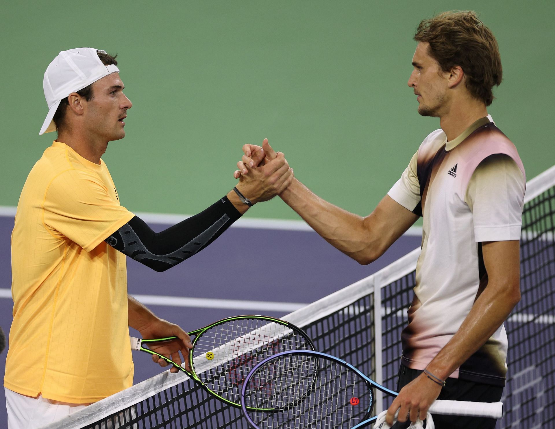 Tommy Paul (L) and Alexander Zverev after their match at the 2022 Indian Wells Masters | Getty Images