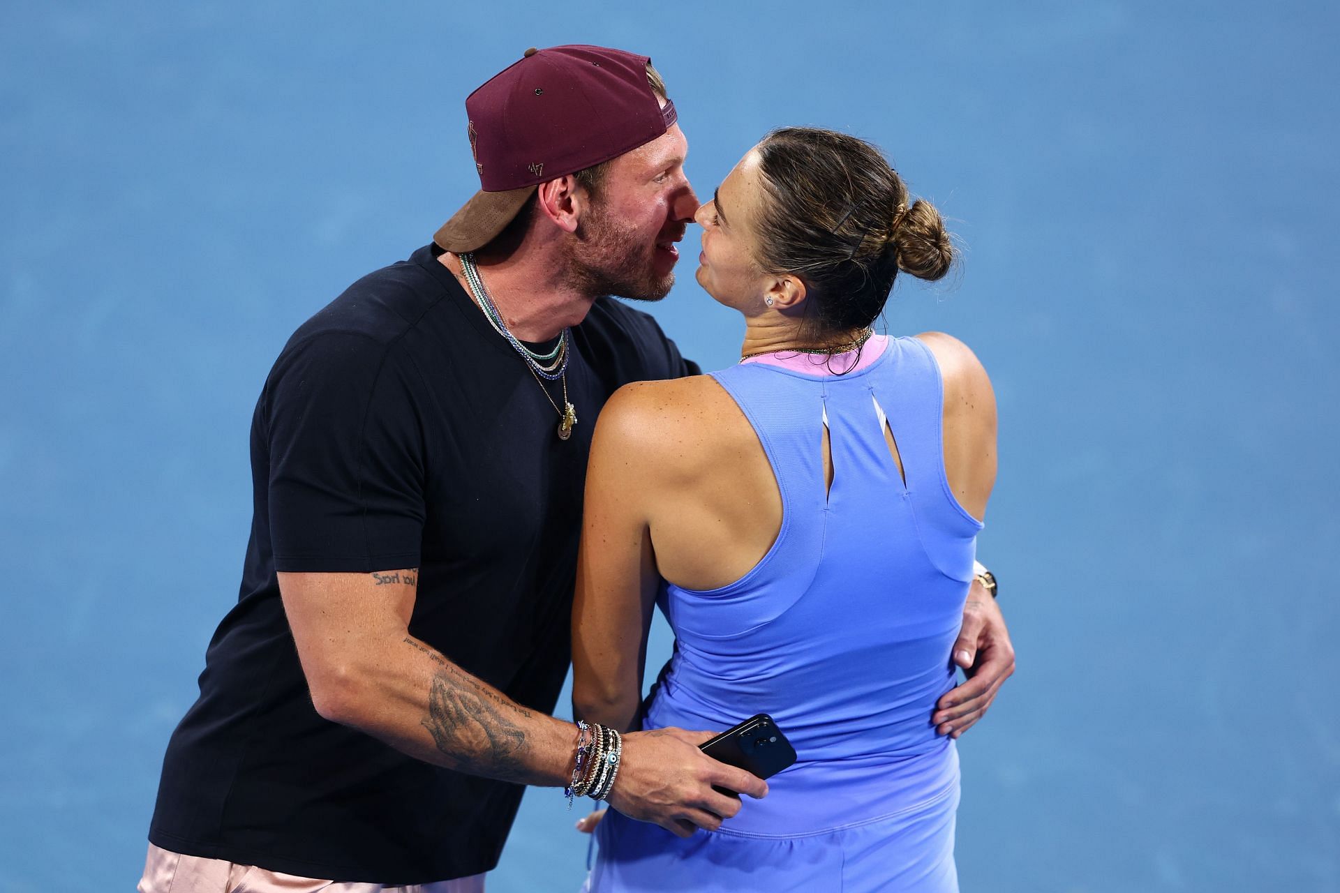 Aryna Sabalenka and Georgios Frangulis share a kiss in Brisbane (Source: Getty)