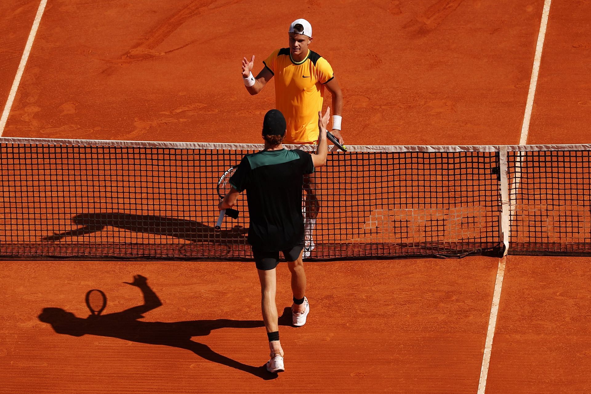 Holger Rune and Jannik Sinner in action at the Rolex Monte-Carlo Masters - (Source: Getty)