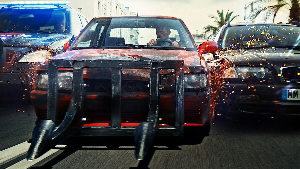 Lost Bullet&#039;s car chases level up its action-packed scenes. (Image via Netflix)