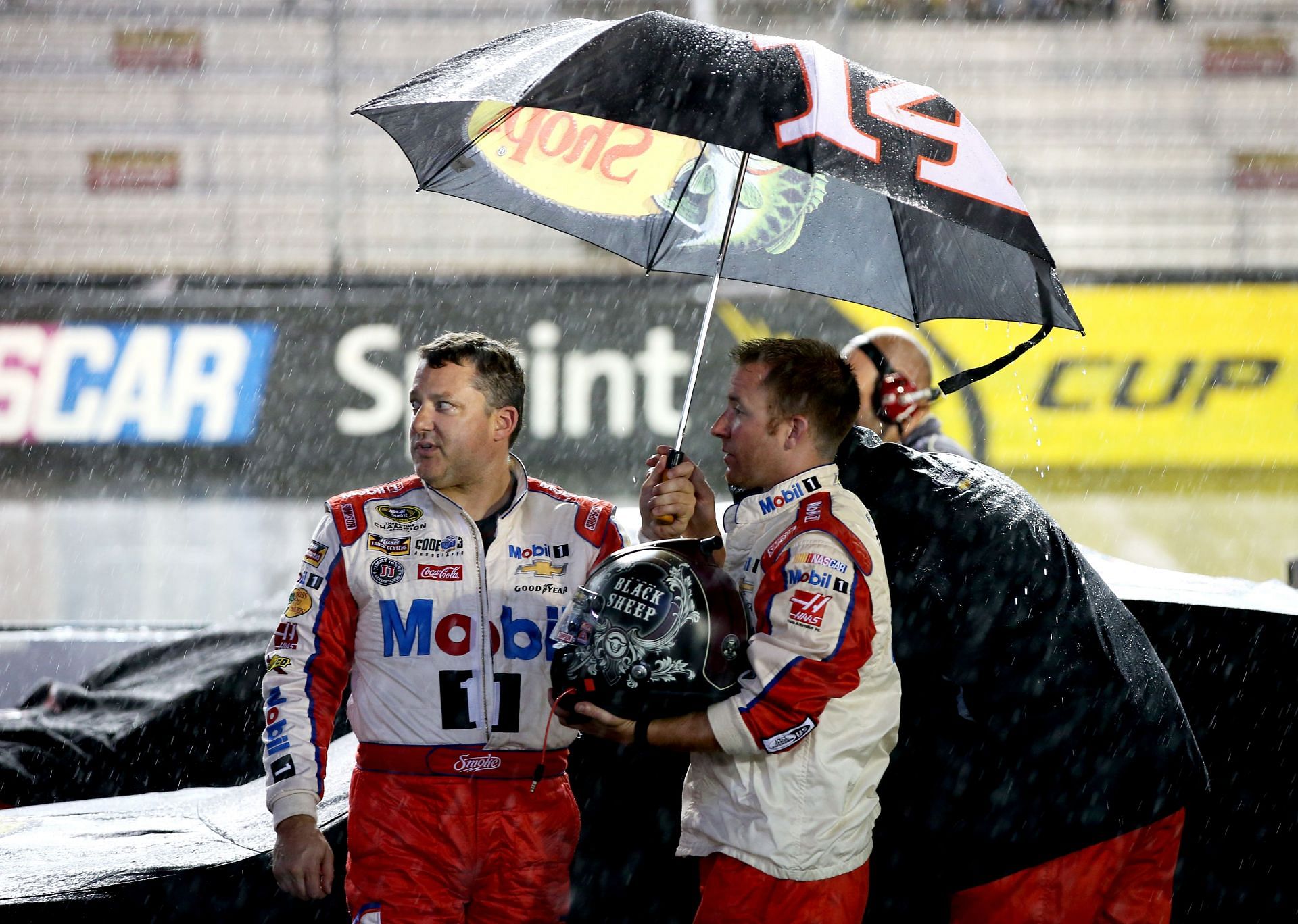 BRISTOL, TN - AUGUST 20:  Tony Stewart, driver of the #14 Haas Automation Chevrolet, stands in the rain during the NASCAR Sprint Cup Series Bass Pro Shops NRA Night Race at Bristol Motor Speedway on August 20, 2016 in Bristol, Tennessee.  (Photo by Sean Gardner/Getty Images) - Source: Getty