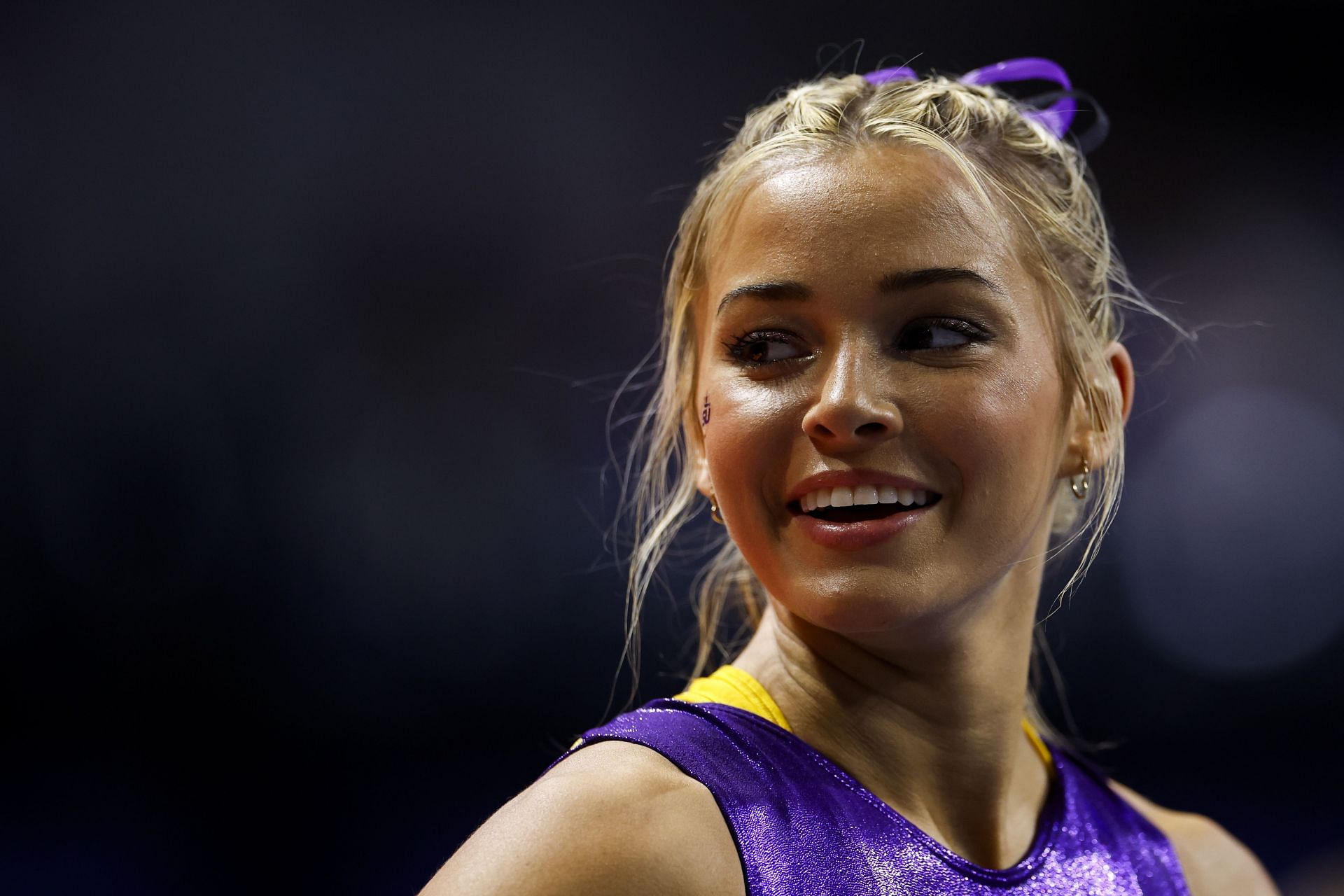 Olivia Dunne looks on before a meet (Photo by James Gilbert/Getty Images)