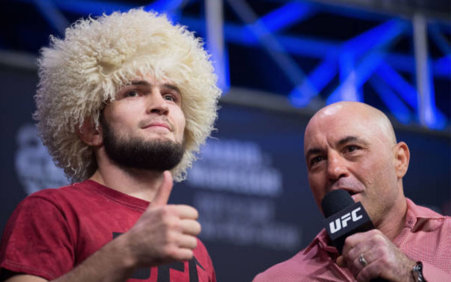 Joe Rogan (right) reacts to Khabib Nurmagomedov