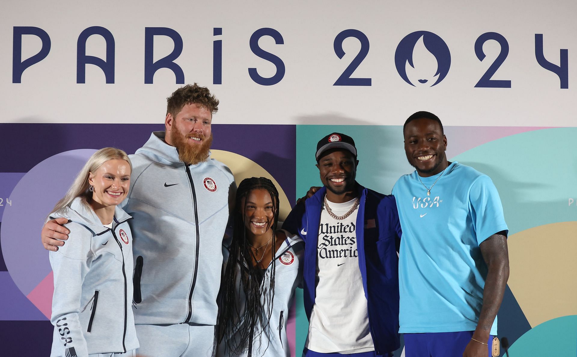 (L-R) Ryan Crouser, Katie Moon, Tara Davis-Woodhall, Noah Lyles and Grant Holloway of the United States pose during a Team USA Track &amp; Field press conference - Source: Getty