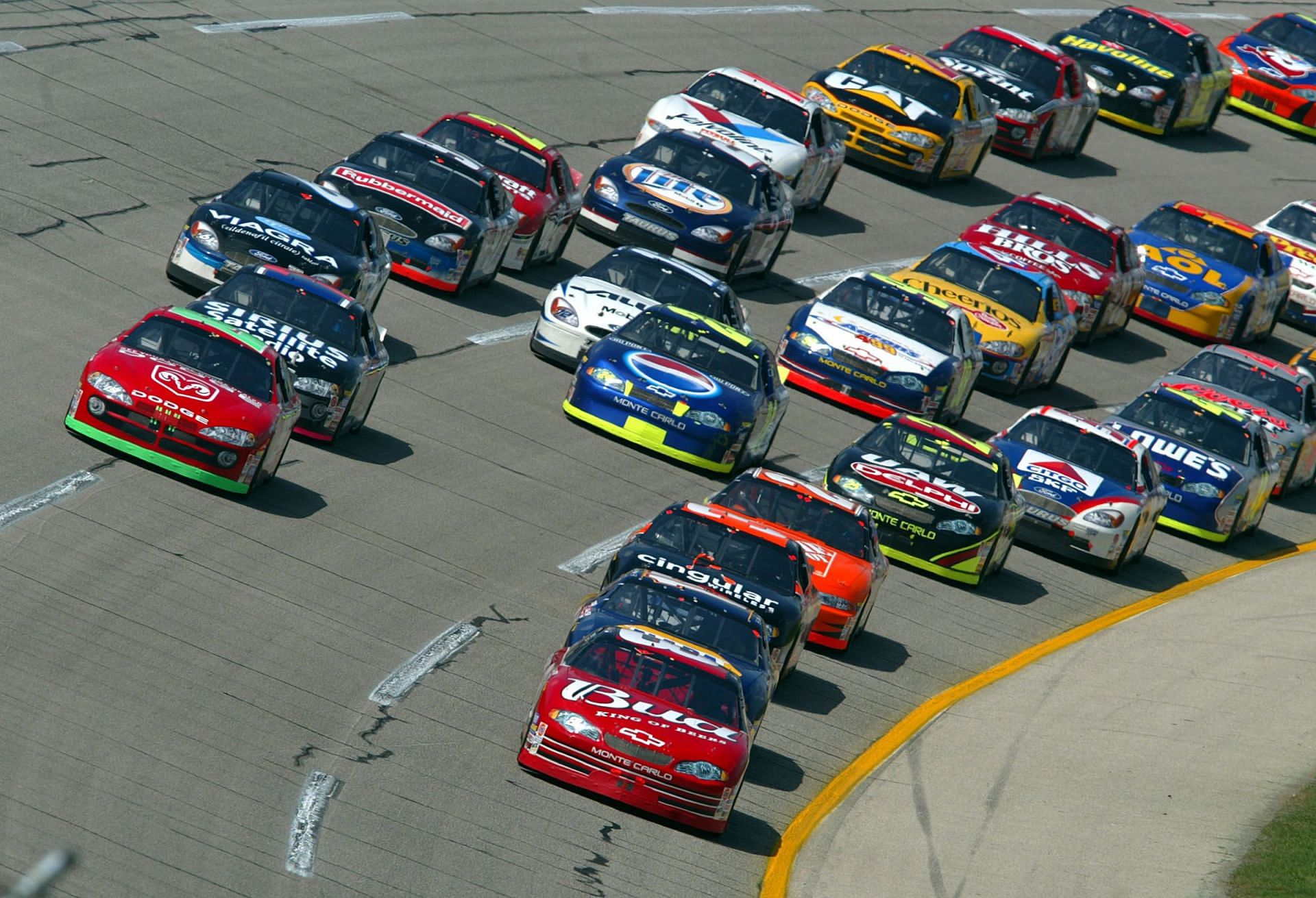 Dale Earnhardt Jr., driver of the Budweiser Chevrolet Monte Carlo, leads the pack - Source: Getty