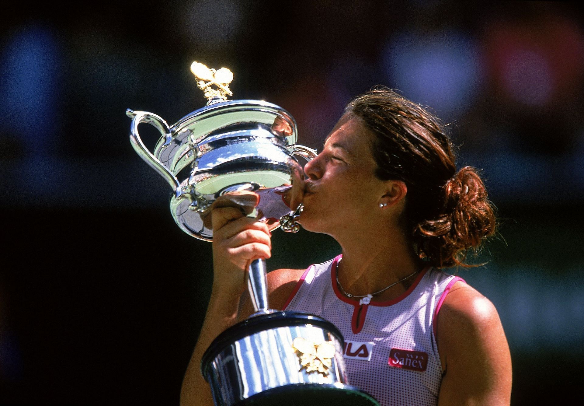 Jennifer Capriati kissing her 2002 Australian Open trophy - Source: Getty