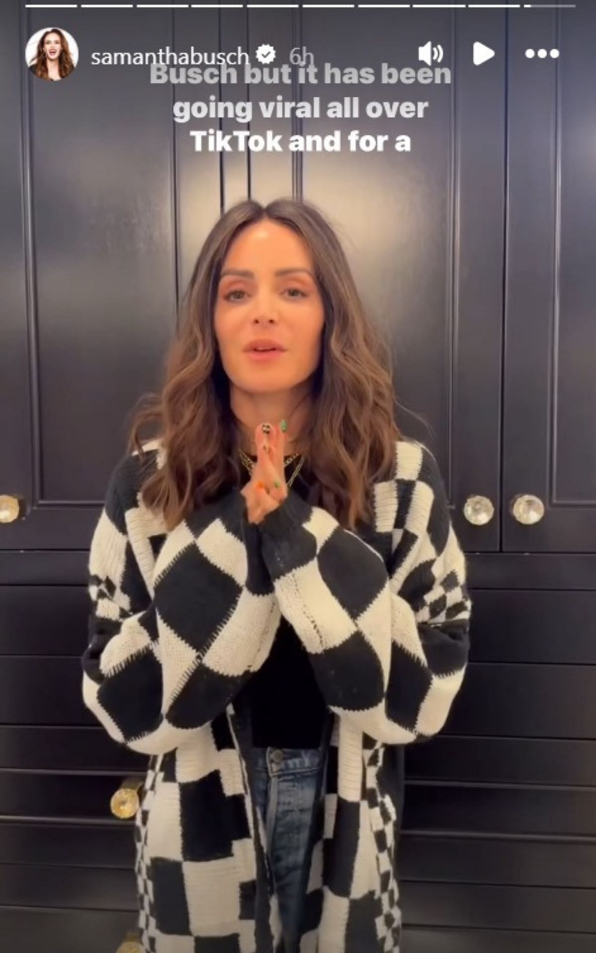 Samantha Busch, wife of NASCAR legend Kyle Busch explains why shoppers should pick up her new black-and-white checkered cardigan (@samanthabusch/Instagram)