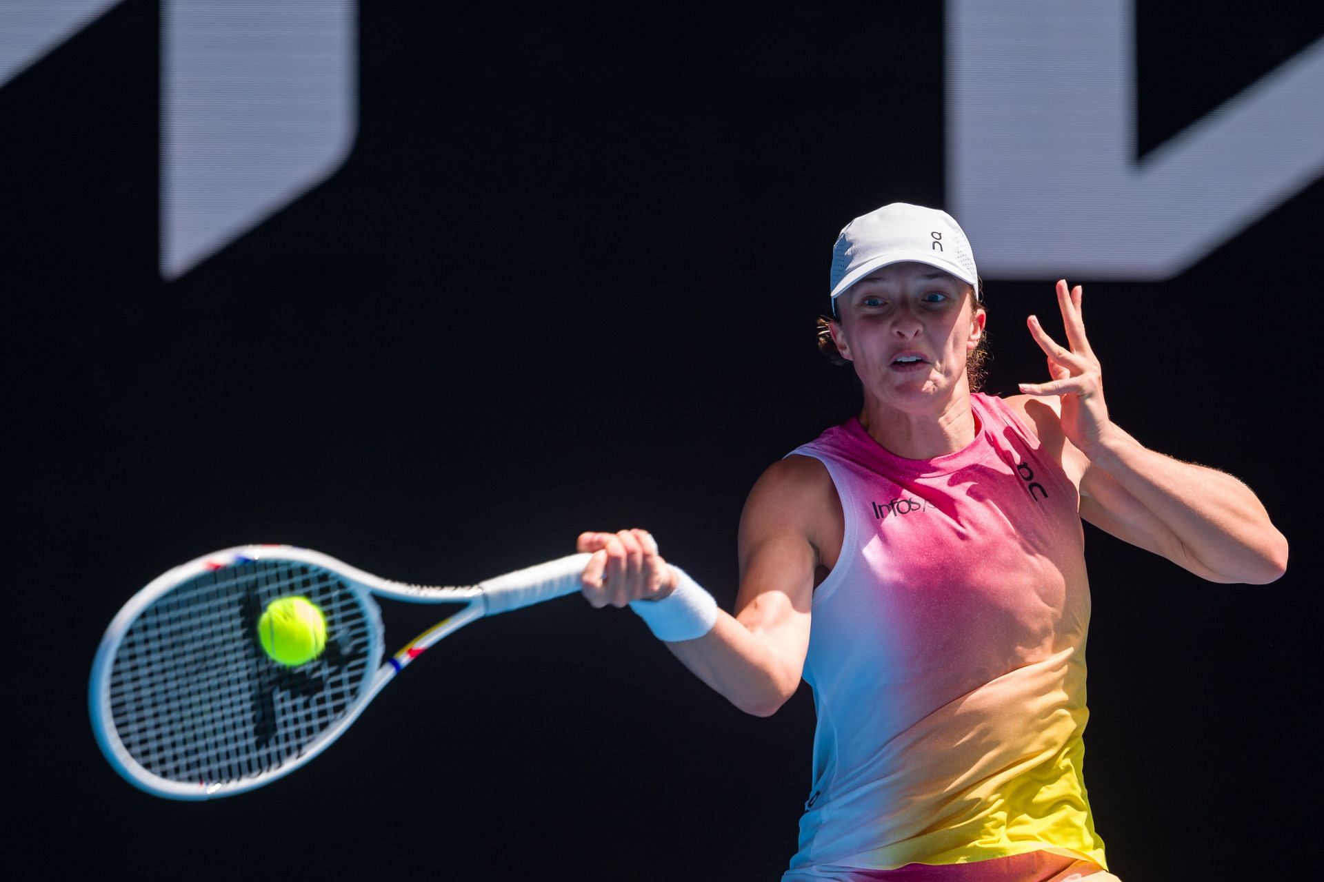 Iga Swiatek hits a forehand during Australian Open 2025 (Source: Getty)