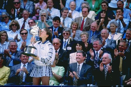 Martina Hingis with the 1997 Australian Open trophy. (Source: Getty)