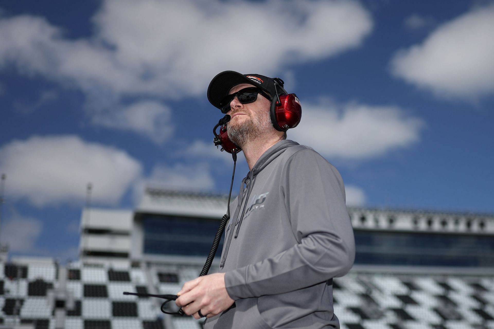 DAYTONA BEACH, FLORIDA - FEBRUARY 18: NASCAR Hall of Famer and JR Motorsports owner, Dale Earnhardt Jr.  looks on during qualifying for the Beef. It