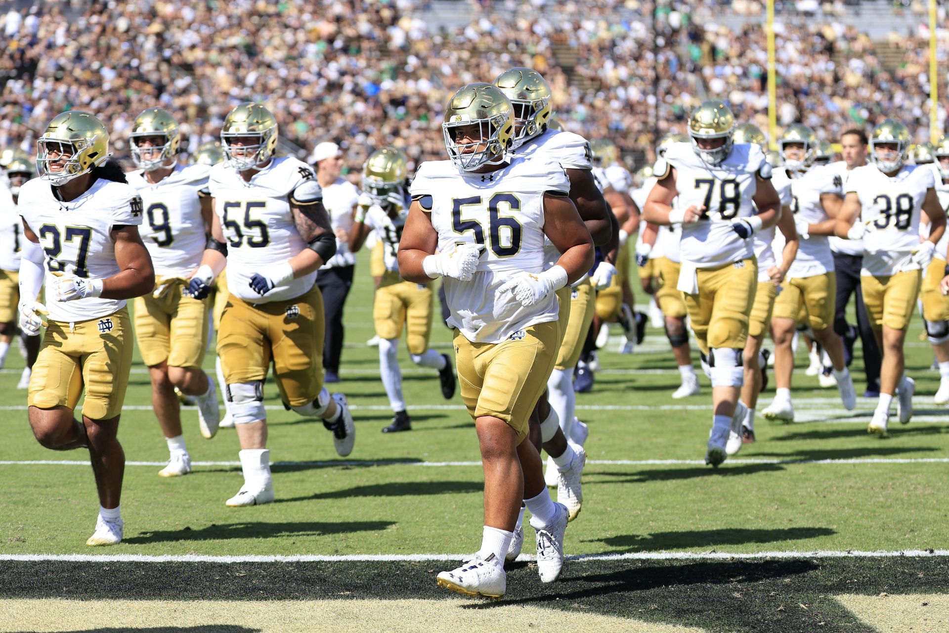 Notre Dame Fighting Irish Offensive Lineman Charles Jagusah (56) warms up before a college football game. (Credits: Getty)