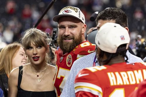 Travis Kelce #87 of the Kansas City Chiefs and Taylor Swift. (Credits: Getty)