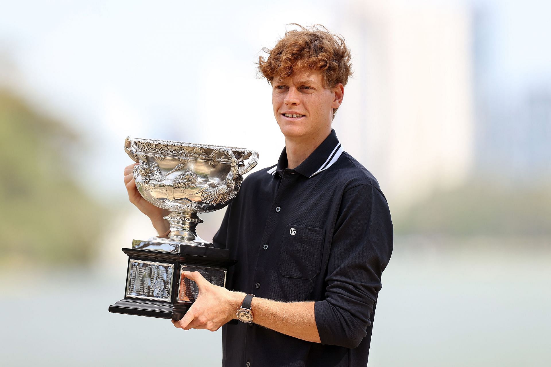 Jannik Sinner with the 2025 Australian Open Men&#039;s singles trophy [Image Source: Getty Images]