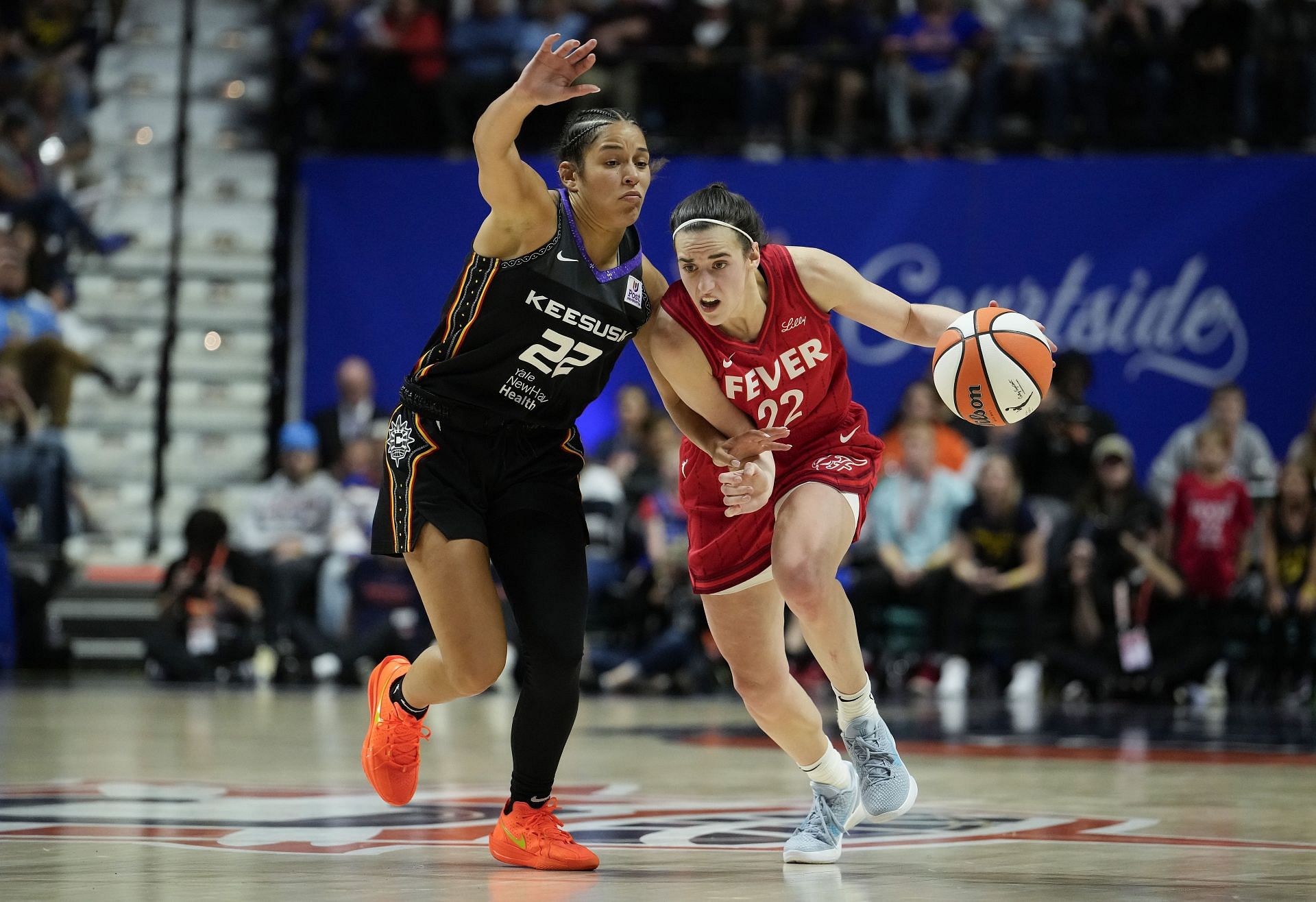 Caitlin Clark #22 of the Indiana Fever in action against the Connecticut Sun. (Credits: Getty)