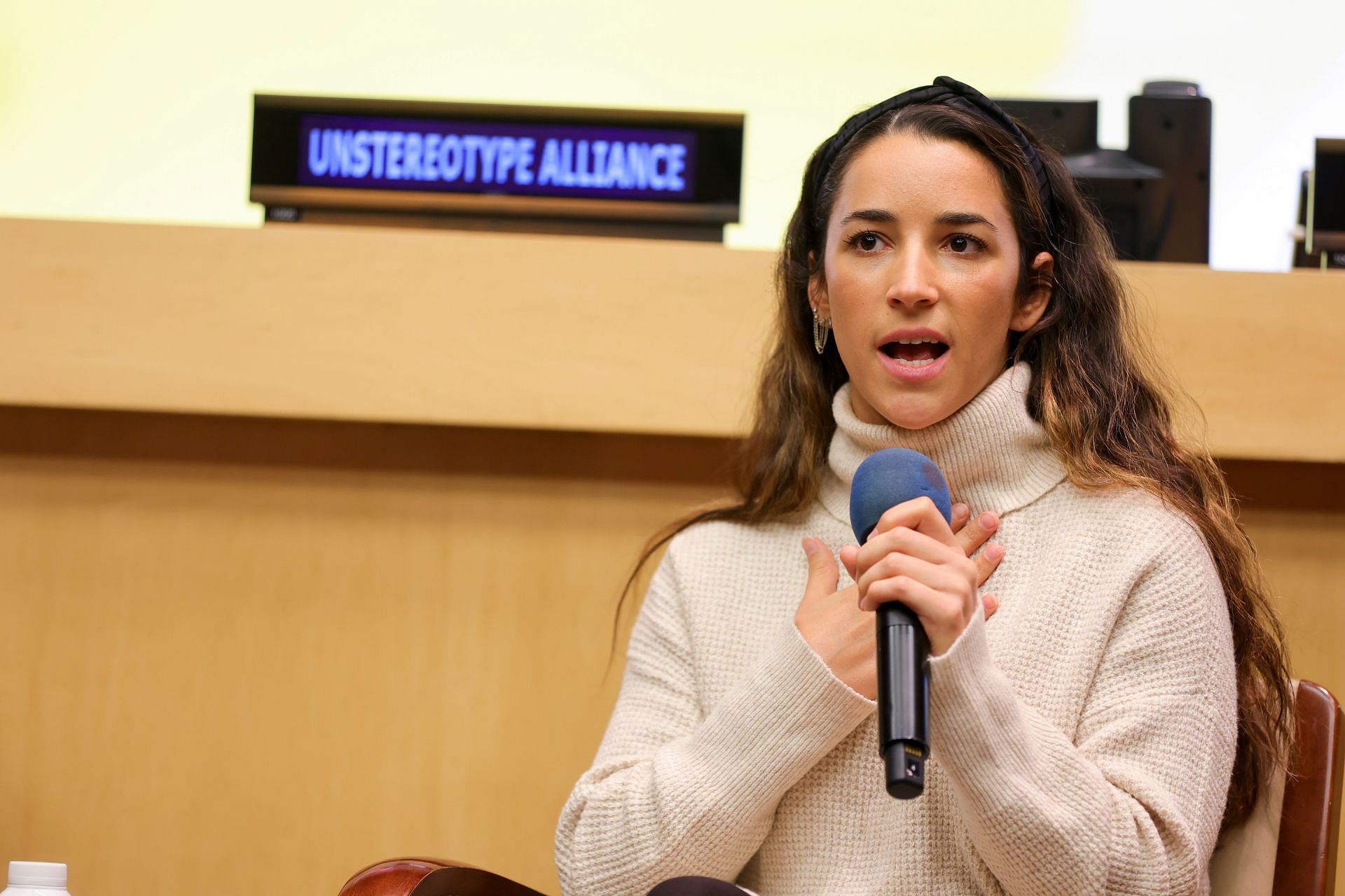 Raisman speaking at the Unstereotype Alliance Global Member Summit 2022 - (Source: Getty)