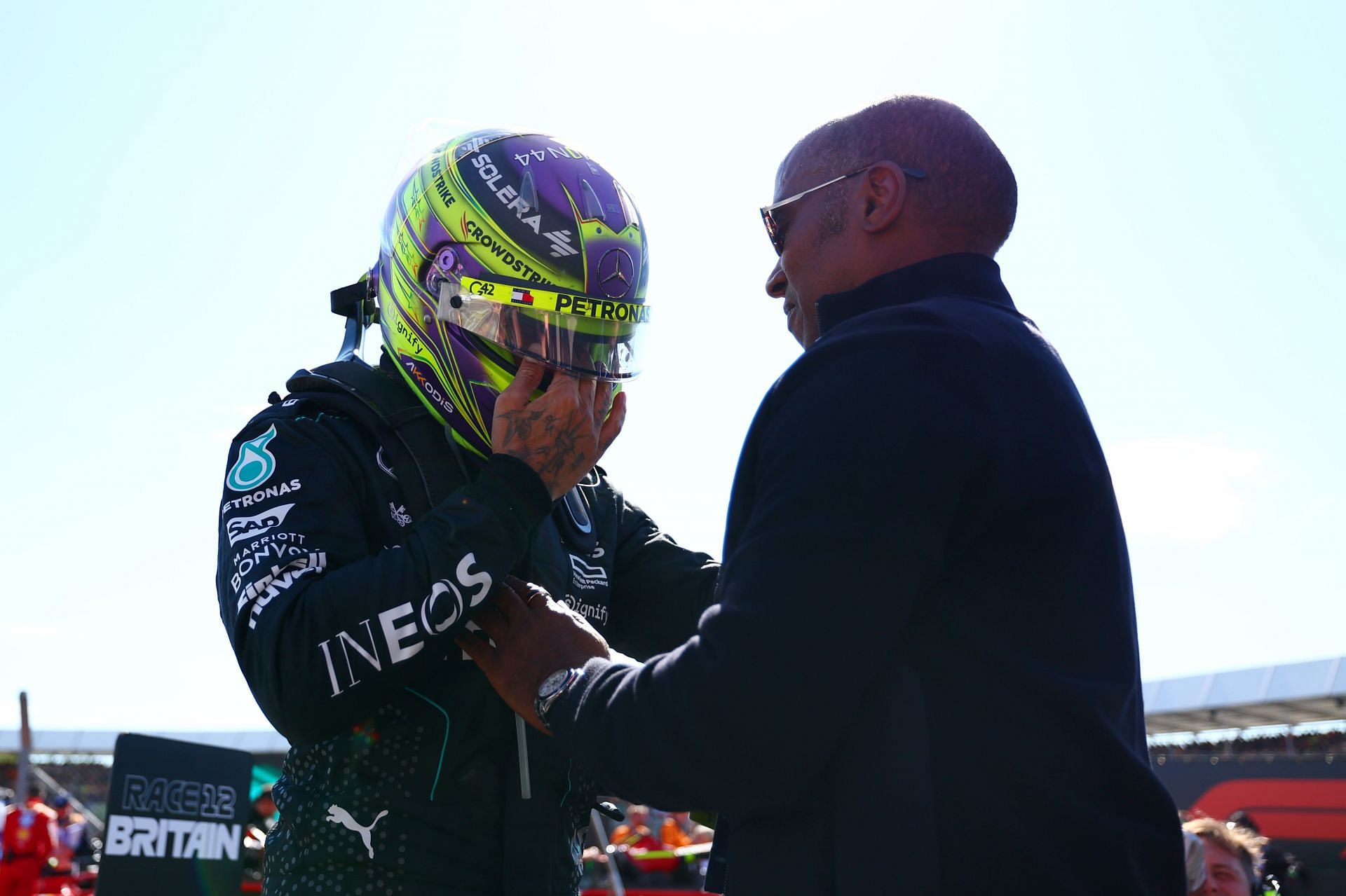 NORTHAMPTON, ENGLAND - JULY 07: Race winner Lewis Hamilton of Great Britain and Mercedes celebrates with father Anthony Hamilton in parc ferme during the F1 Grand Prix of Great Britain at Silverstone Circuit on July 07, 2024 in Northampton, England. (Photo by Bryn Lennon - Formula 1/Formula 1 via Getty Images) - Source: Getty