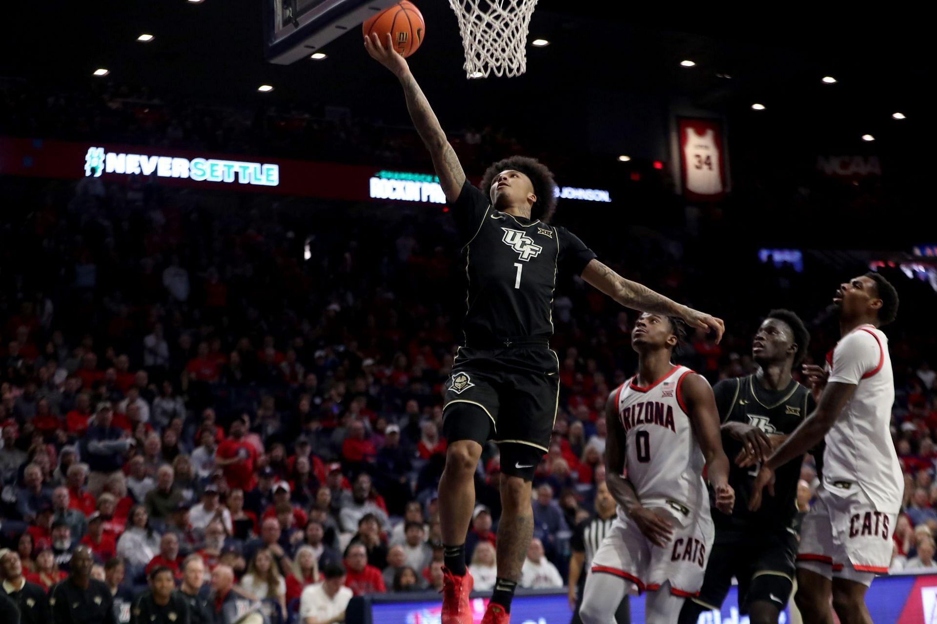 UCF Knights guard Mikey Williams (#1) lays up the ball during the second half of the game against the Arizona Wildcats on January 11, 2025, at McKale Center in Tucson, AZ. Photo: Getty