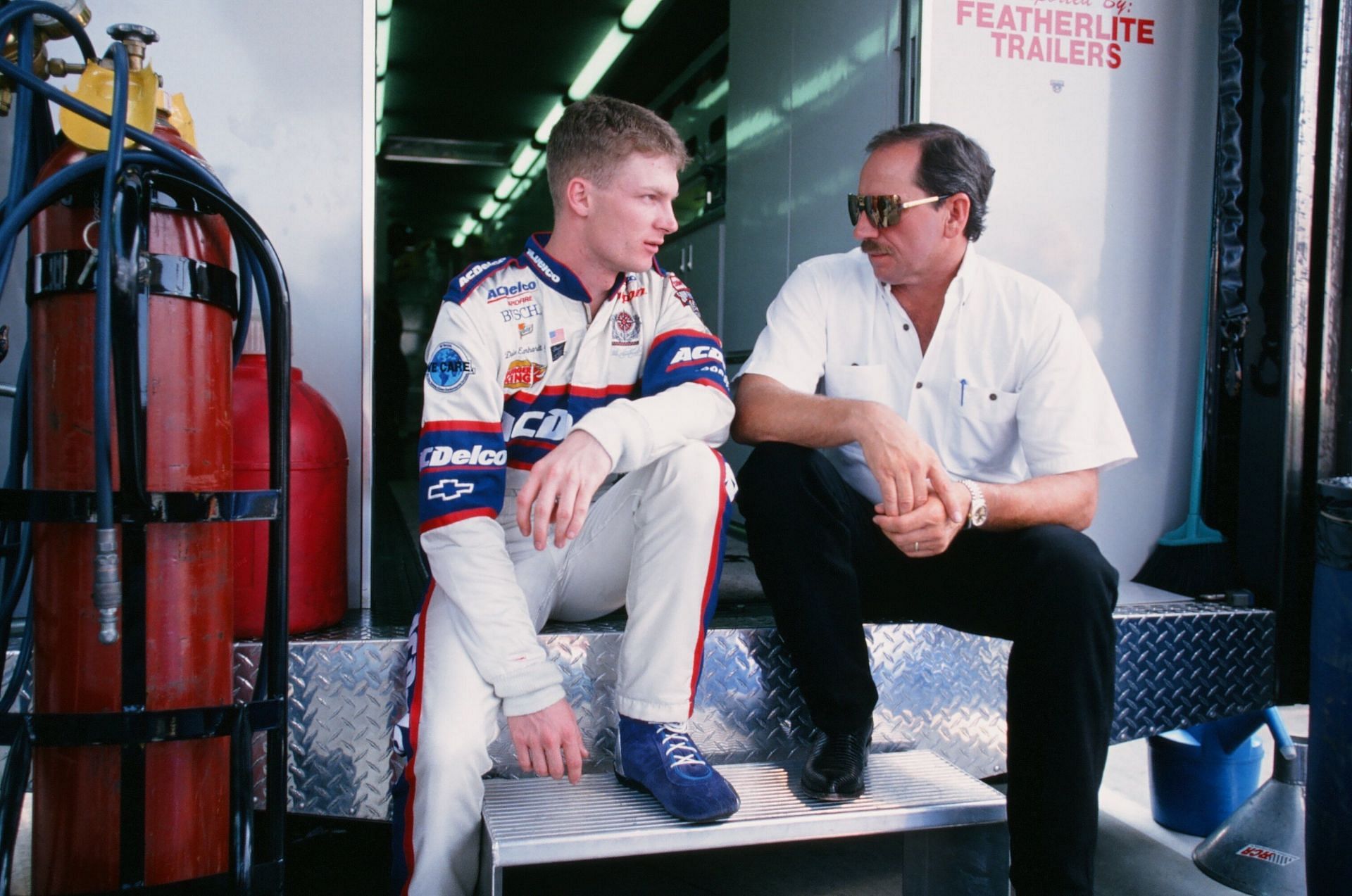 Dale Earnhardt Jr in conversation with his father Dale Earnhardt in 1998 (Source: Getty Images)