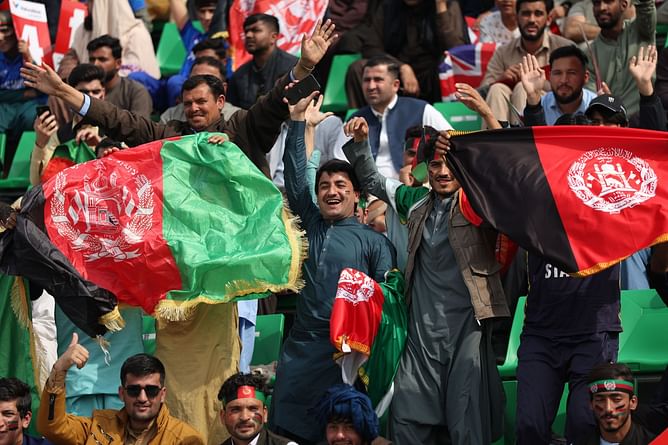 Fan spotted wearing RCB jersey in Lahore Stadium during AFG vs ENG 2025 Champions Trophy match