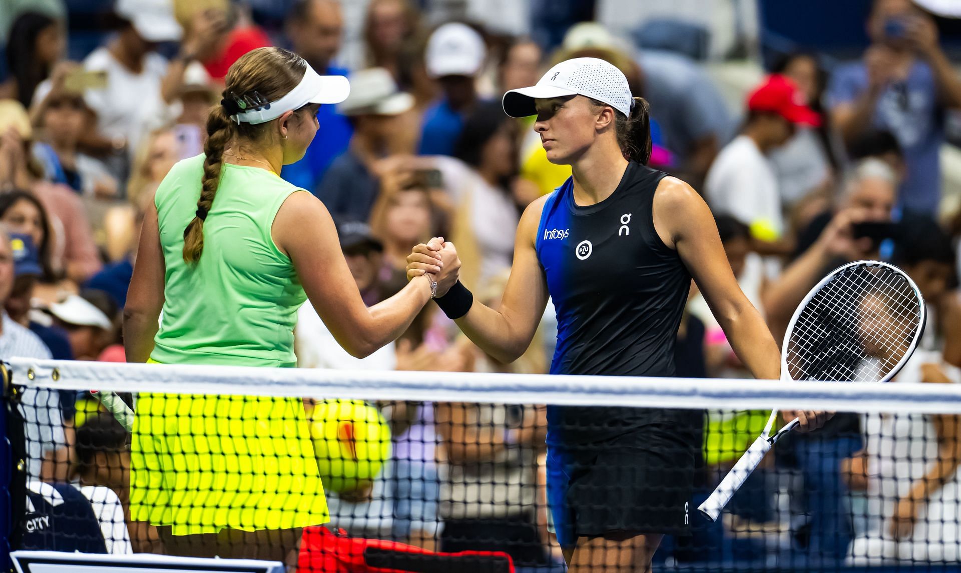 Jelena Ostapenko(L) and Iga Swiatek (R) at the 2023 US Open - Source: Getty