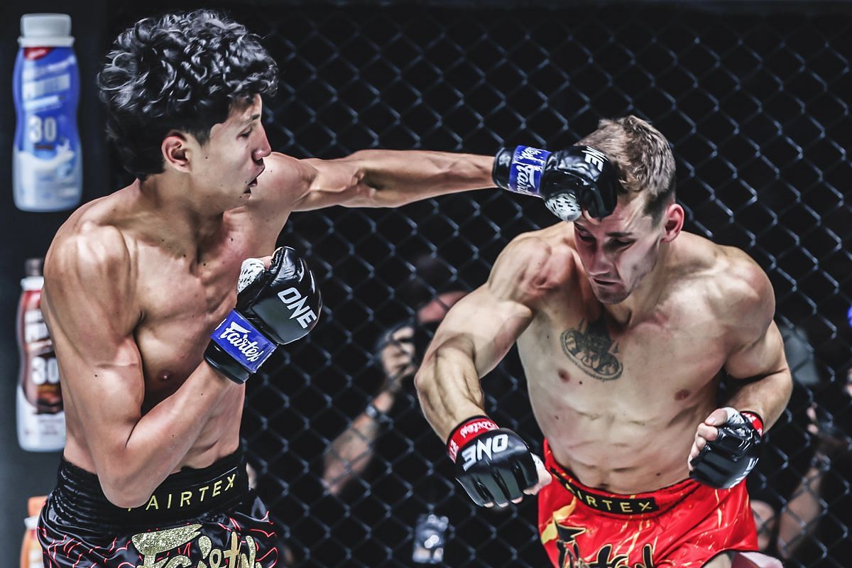 Nabil Anane going blow-for-blow with Nico Carrillo at ONE 170. [Photo via: ONE Championship]