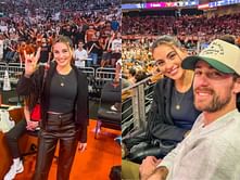 Gianna Tulio rocks black fringe jacket and leather pants at Texas vs Arkansas basketball game with husband Ryan Blaney