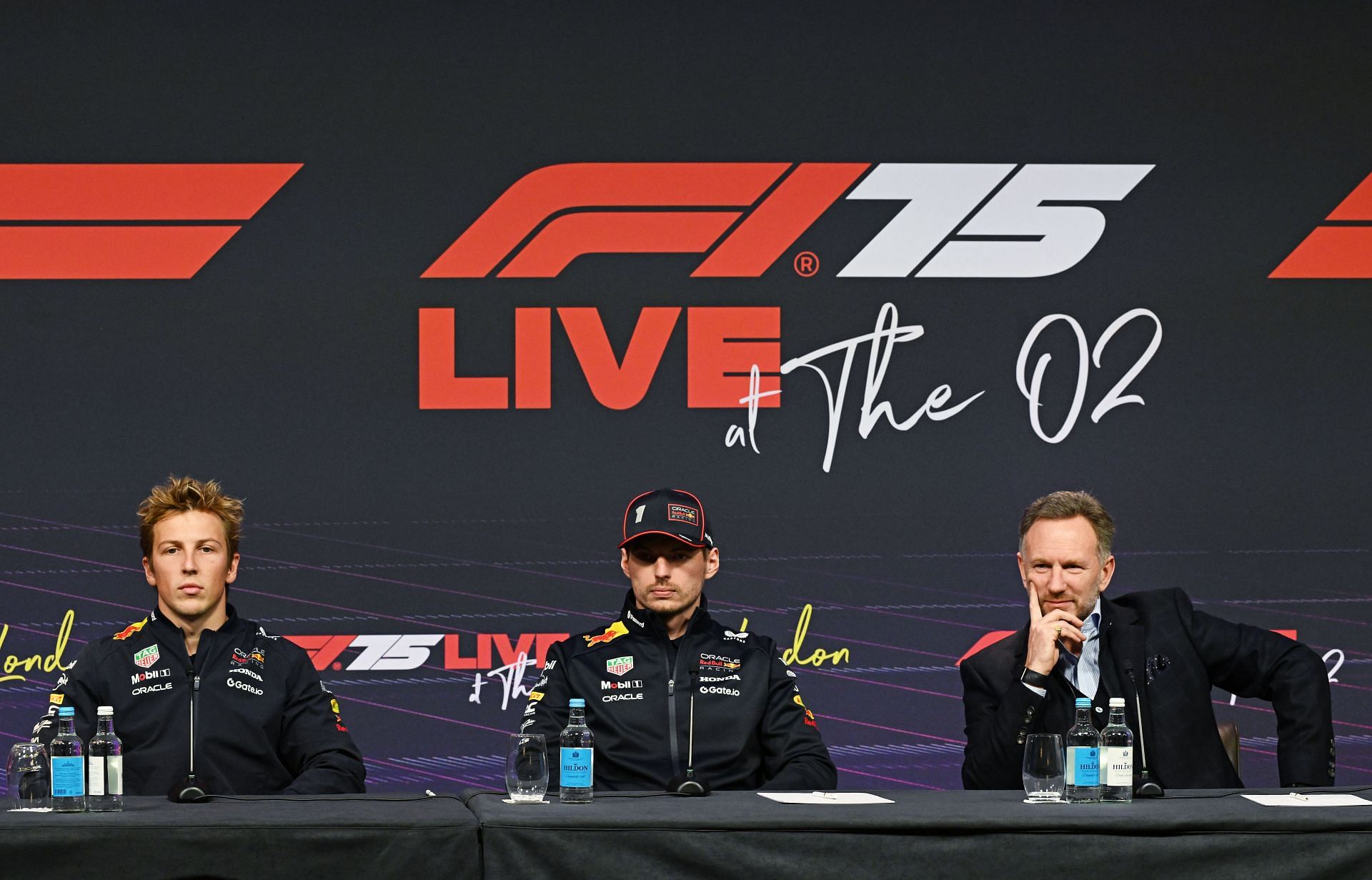 Liam Lawson, Max Verstappen, and Christian Horner at the F1 75 Live - Press Conference - Source: Getty