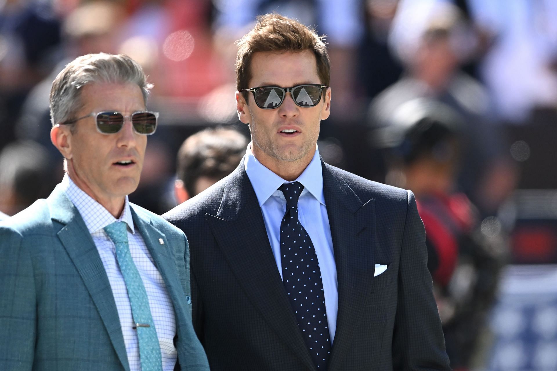 Fox announcers Kevin Burkhardt (L) and Tom Brady - Source: Getty